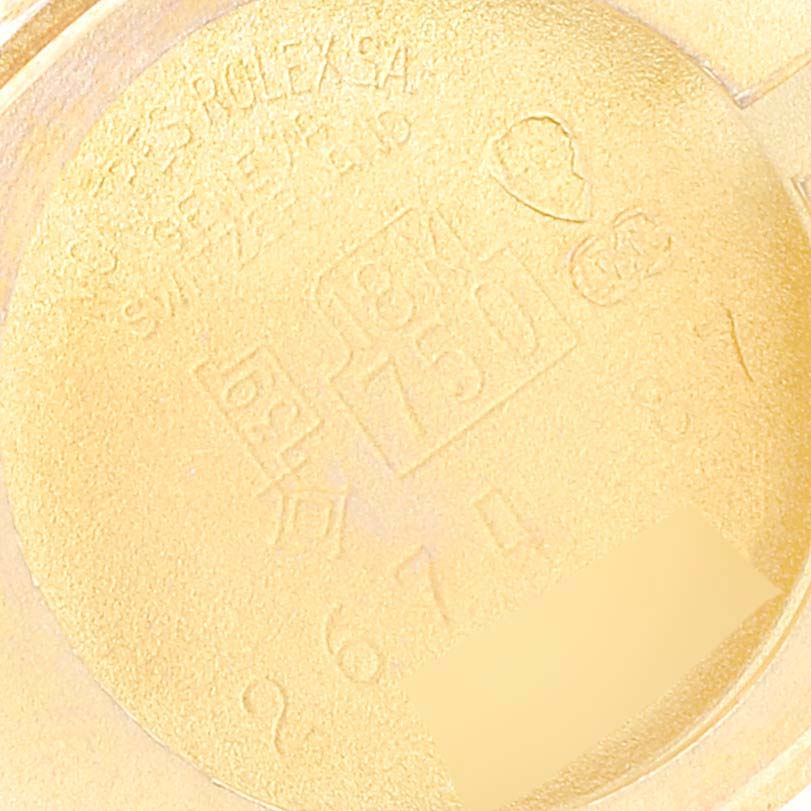 This image shows the interior case back of the Rolex Cellini 2674 Women's Yellow Gold Champagne Dial 2674 Women's Yellow Gold Champagne Dial watch, highlighting the engravings and hallmarks.