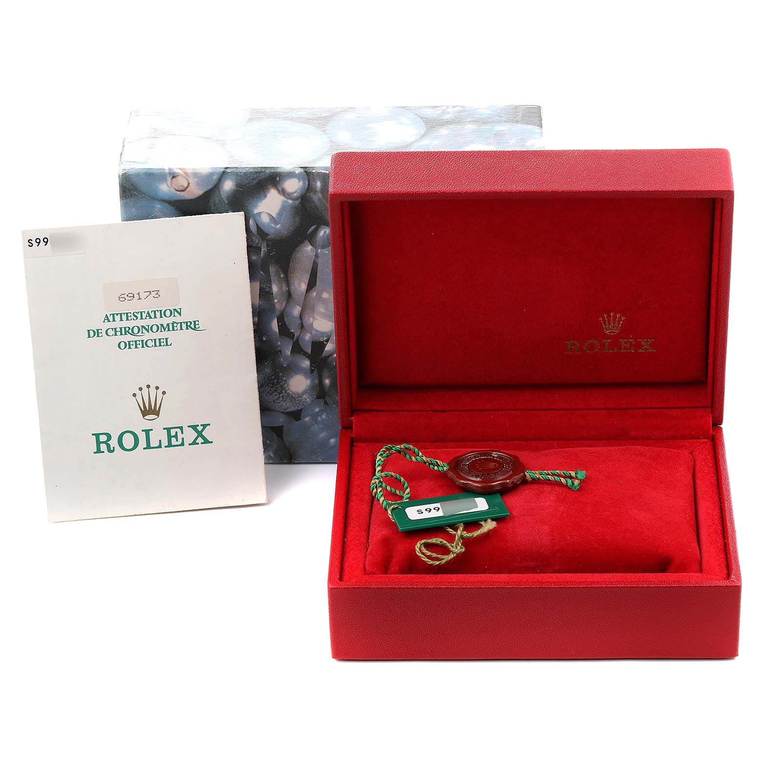 This image shows the open box and documentation for a Rolex Datejust 69173 Women's Steel and Gold (two tone) Champagne Dial 69173 Women's Steel and Gold (two tone) Champagne Dial watch, including serial tags.