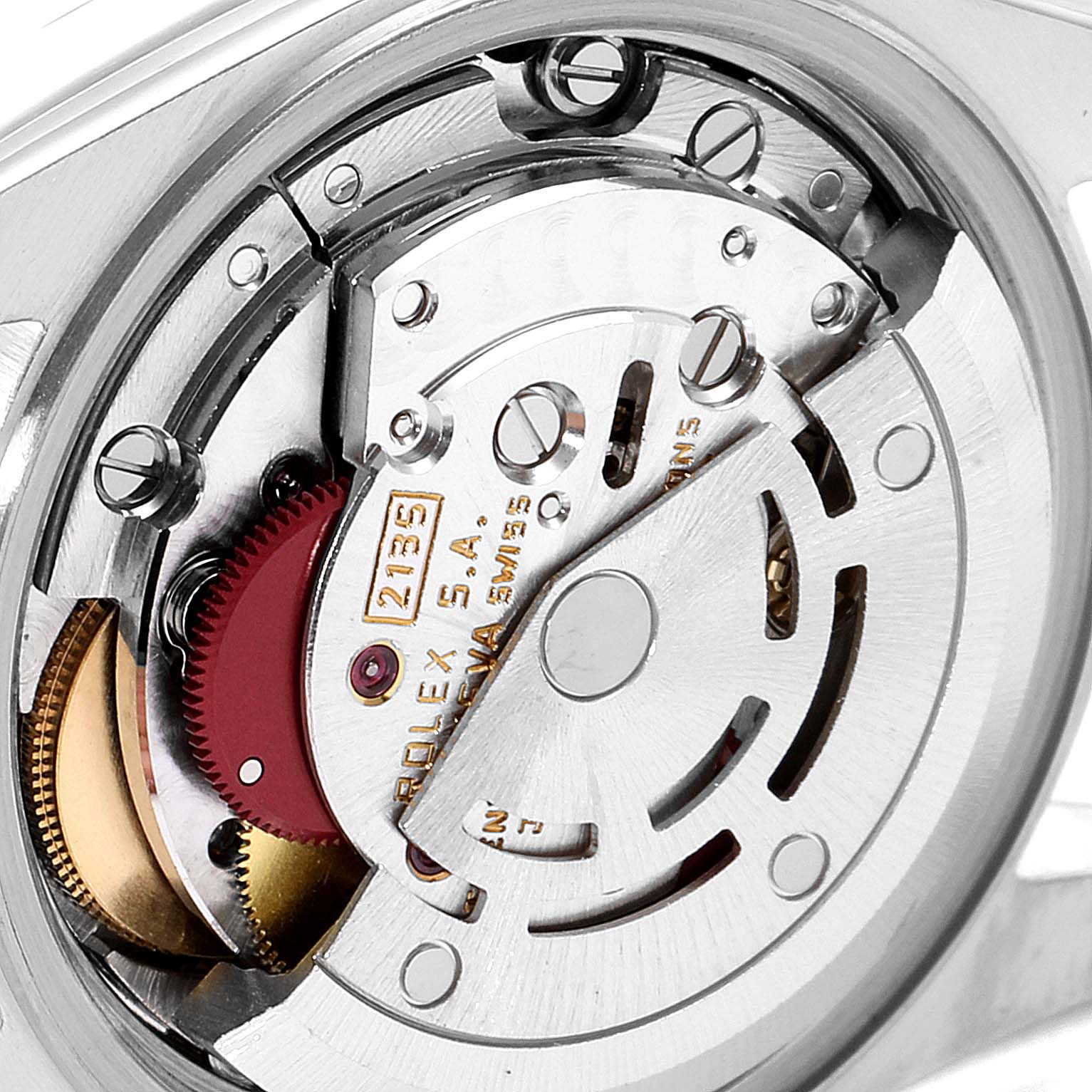 This image shows a close-up view of the intricate inner movement mechanism of a Rolex Datejust 69173 Women's Steel and Gold (two tone) Champagne Dial 69173 Women's Steel and Gold (two tone) Champagne Dial watch.