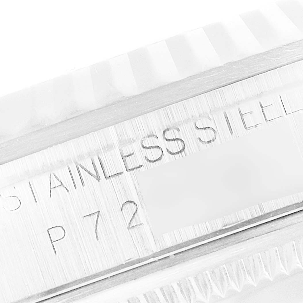 This image shows a close-up of the stainless steel case and serial number engraving on the Rolex Datejust 16234 Men's Stainless Steel Blue Dial 16234 Men's Stainless Steel Blue Dial watch.