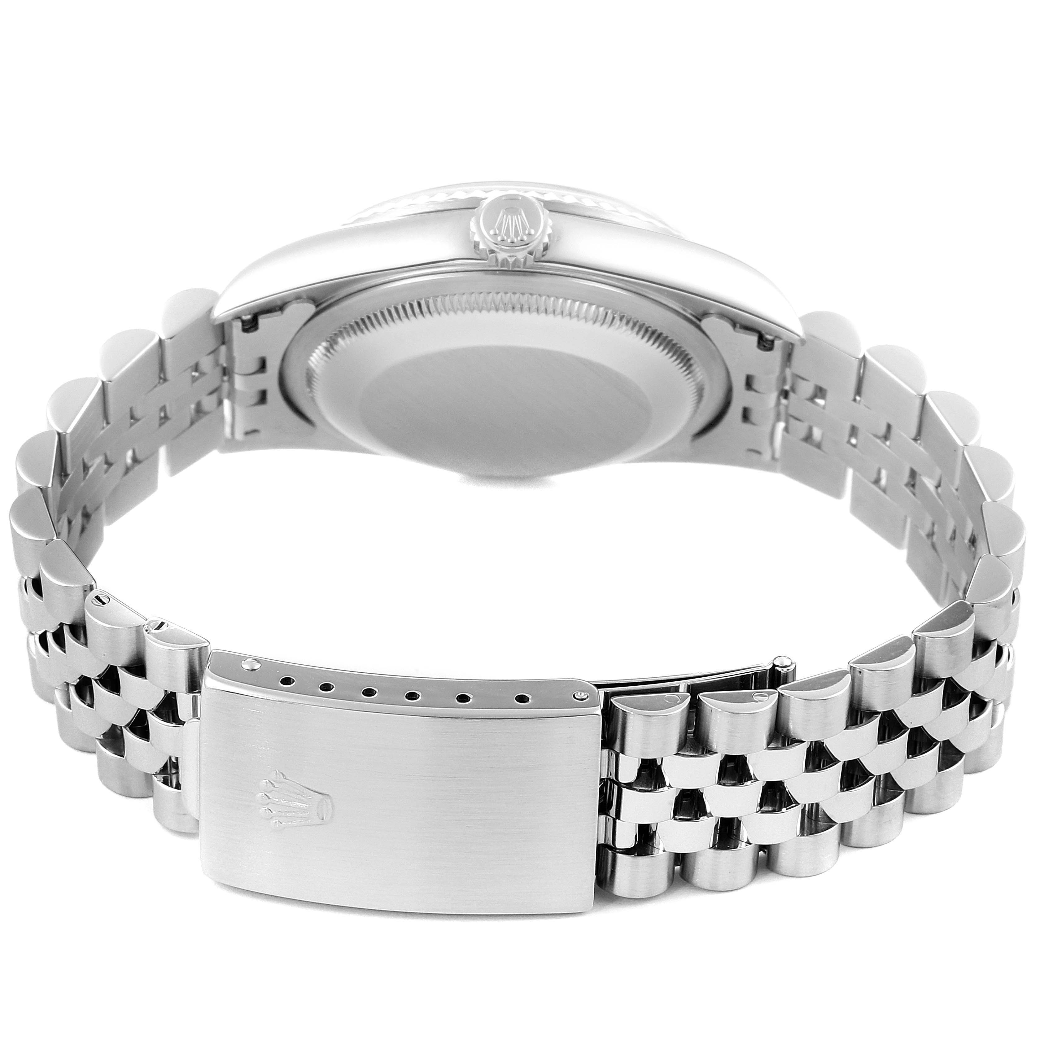 The image shows the back case and bracelet clasp of a Rolex Datejust 16234 Men's Stainless Steel Blue Dial 16234 Men's Stainless Steel Blue Dial watch from a rear angle.