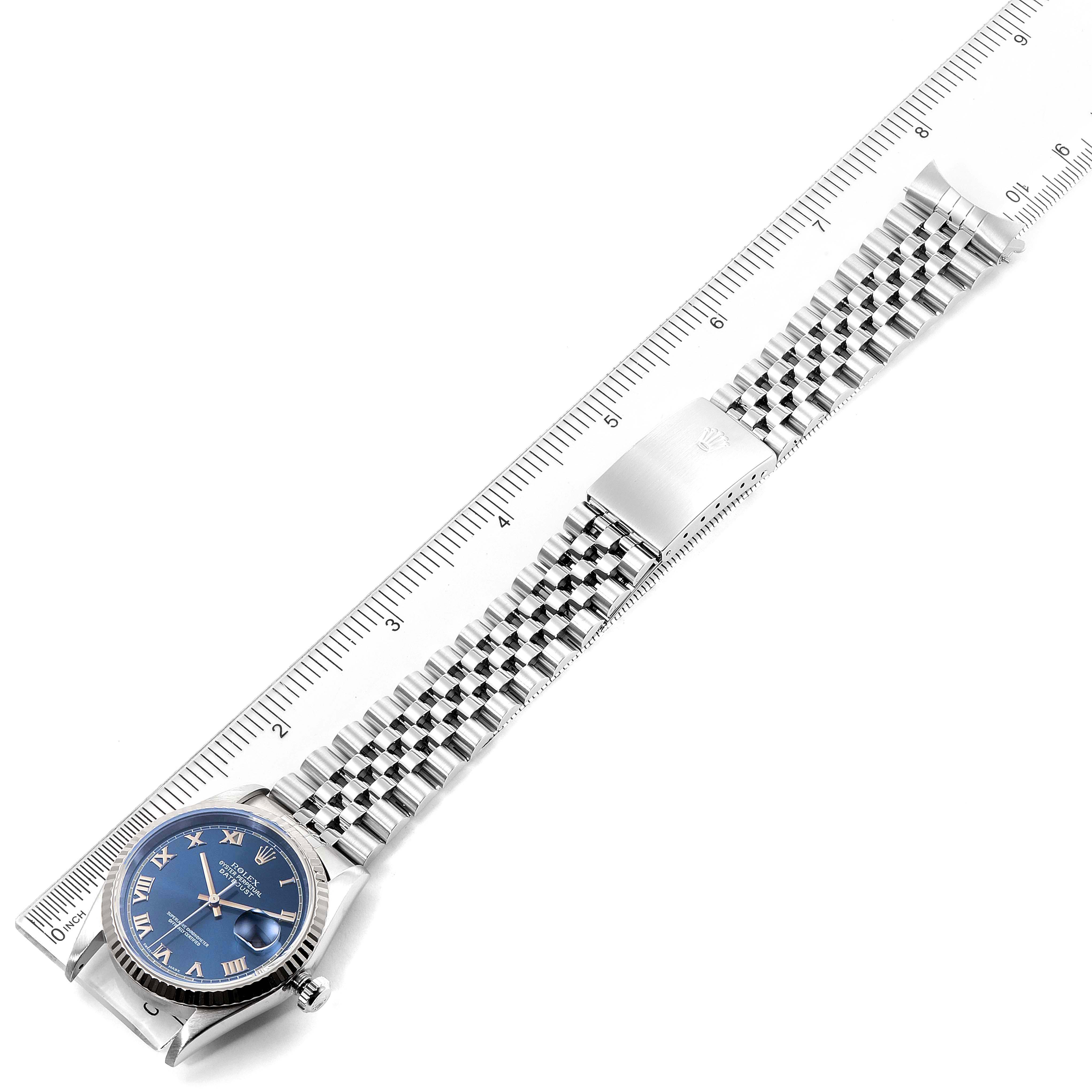 The image shows a Rolex Datejust 16234 Men's Stainless Steel Blue Dial 16234 Men's Stainless Steel Blue Dial watch laid flat with its face, bracelet, and clasp visible, measured alongside a ruler.