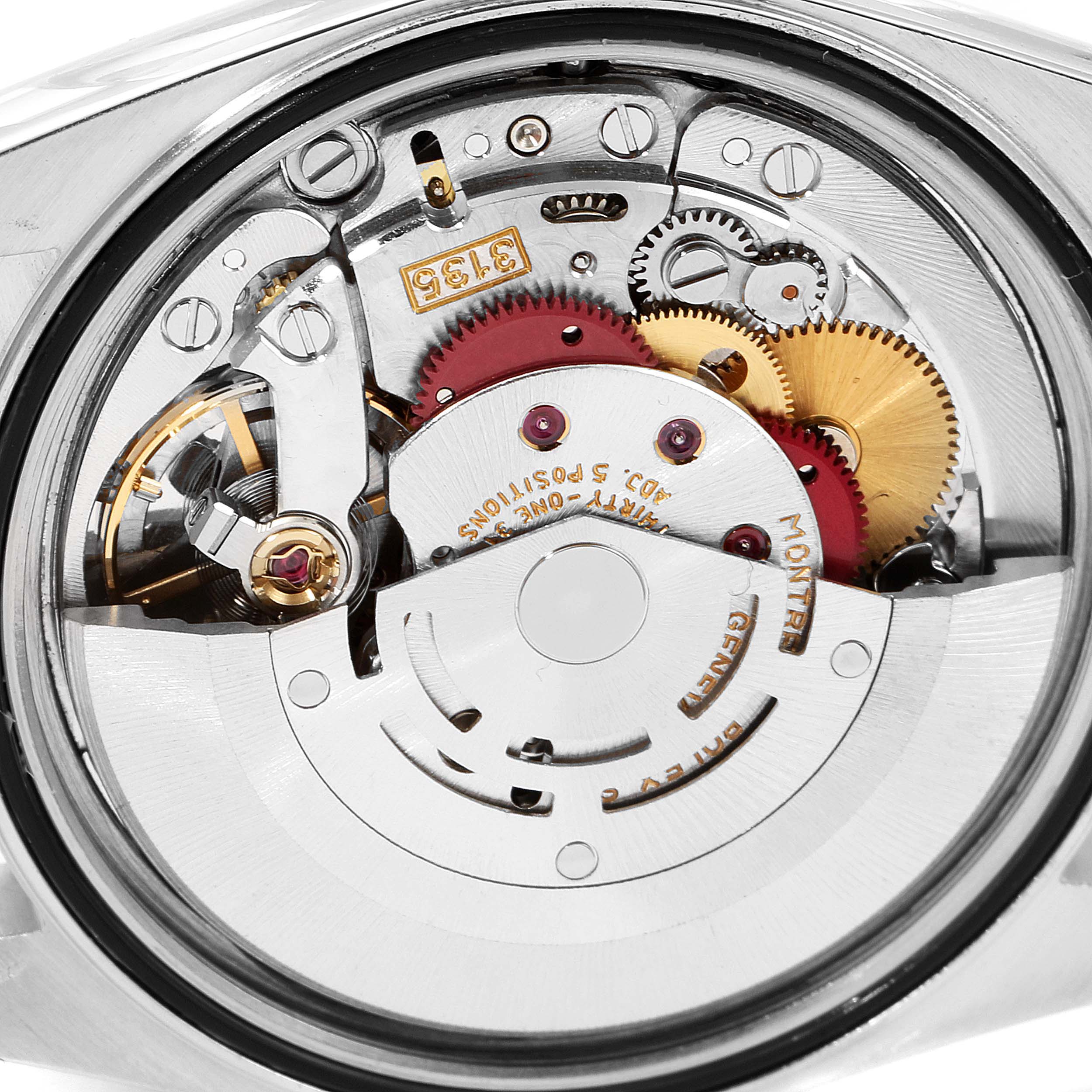 This close-up image shows the intricate internal movement of a Rolex Datejust 16233 Men's Steel and Gold (two tone) Champagne Dial 16233 Men's Steel and Gold (two tone) Champagne Dial watch from the back.