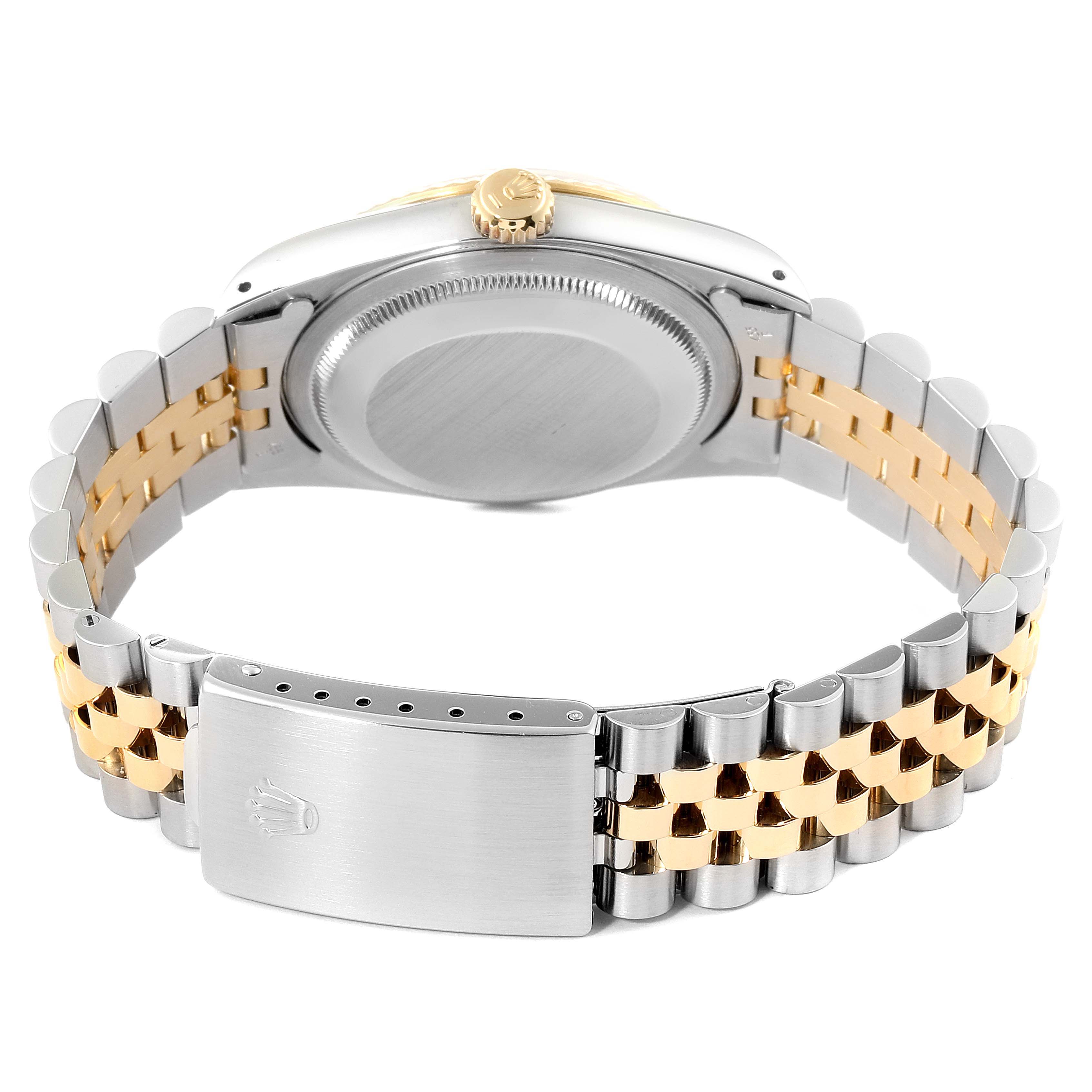 The image shows the back case and bracelet of a Rolex Datejust 16233 Men's Steel and Gold (two tone) Champagne Dial 16233 Men's Steel and Gold (two tone) Champagne Dial watch, focusing on the Jubilee bracelet and clasp.