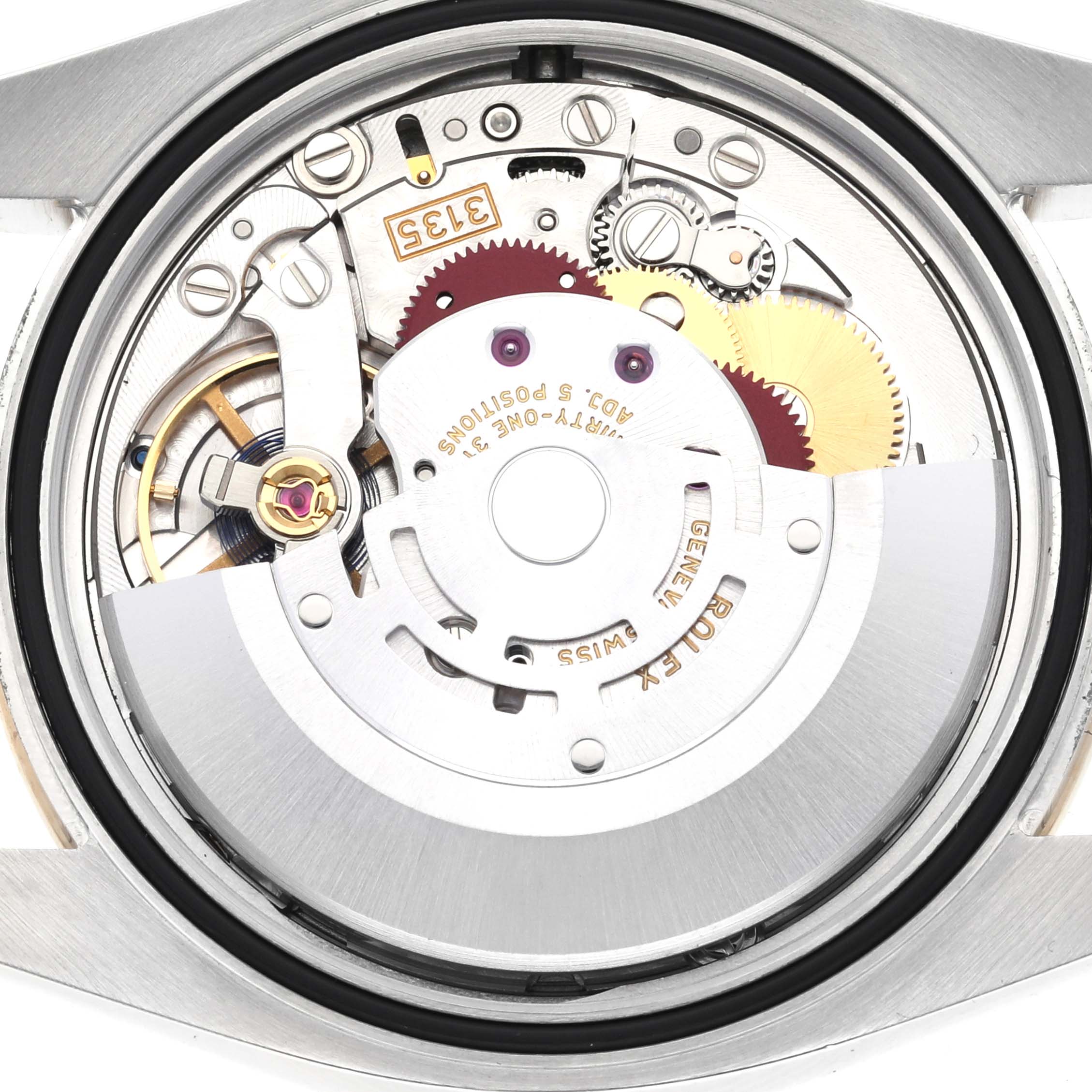 The image shows the internal movement components of a Rolex Datejust 116243 Men
s Steel and Gold (two tone) Silver Dial 116243 Men
s Steel and Gold (two tone) Silver Dial watch viewed from the back.
