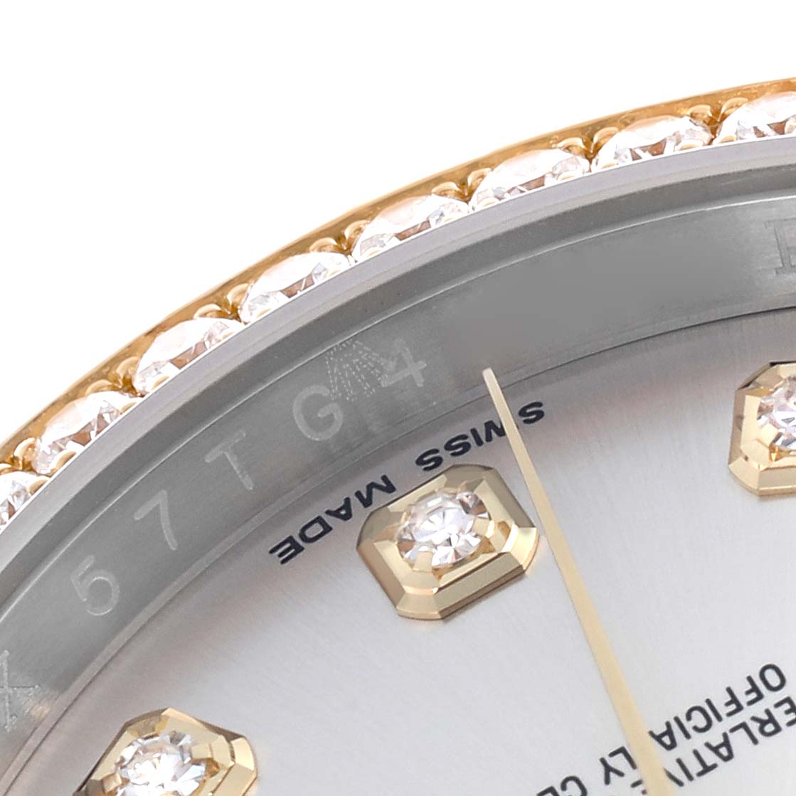 The image shows a close-up of the Rolex Datejust 116243 Men
s Steel and Gold (two tone) Silver Dial 116243 Men
s Steel and Gold (two tone) Silver Dial
s diamond-studded bezel and dial with "Swiss Made" markings.