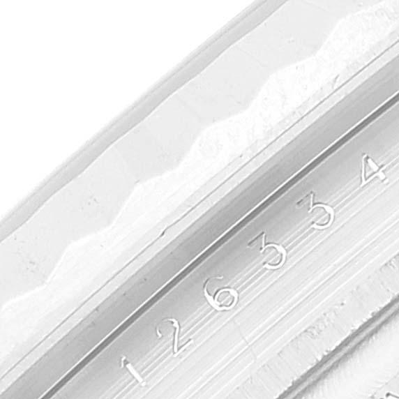 The image shows a close-up of the bezel and part of the rehaut of a Rolex Datejust 41 126334 Men's Stainless Steel Mother of Pearl Dial 126334 Men's Stainless Steel Mother of Pearl Dial watch.