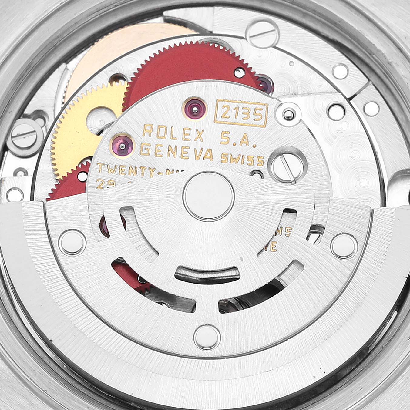 The image shows the internal mechanism of a Rolex Datejust 69190 Women's Stainless Steel Blue Dial 69190 Women's Stainless Steel Blue Dial model, highlighting the automatic movement and gears.