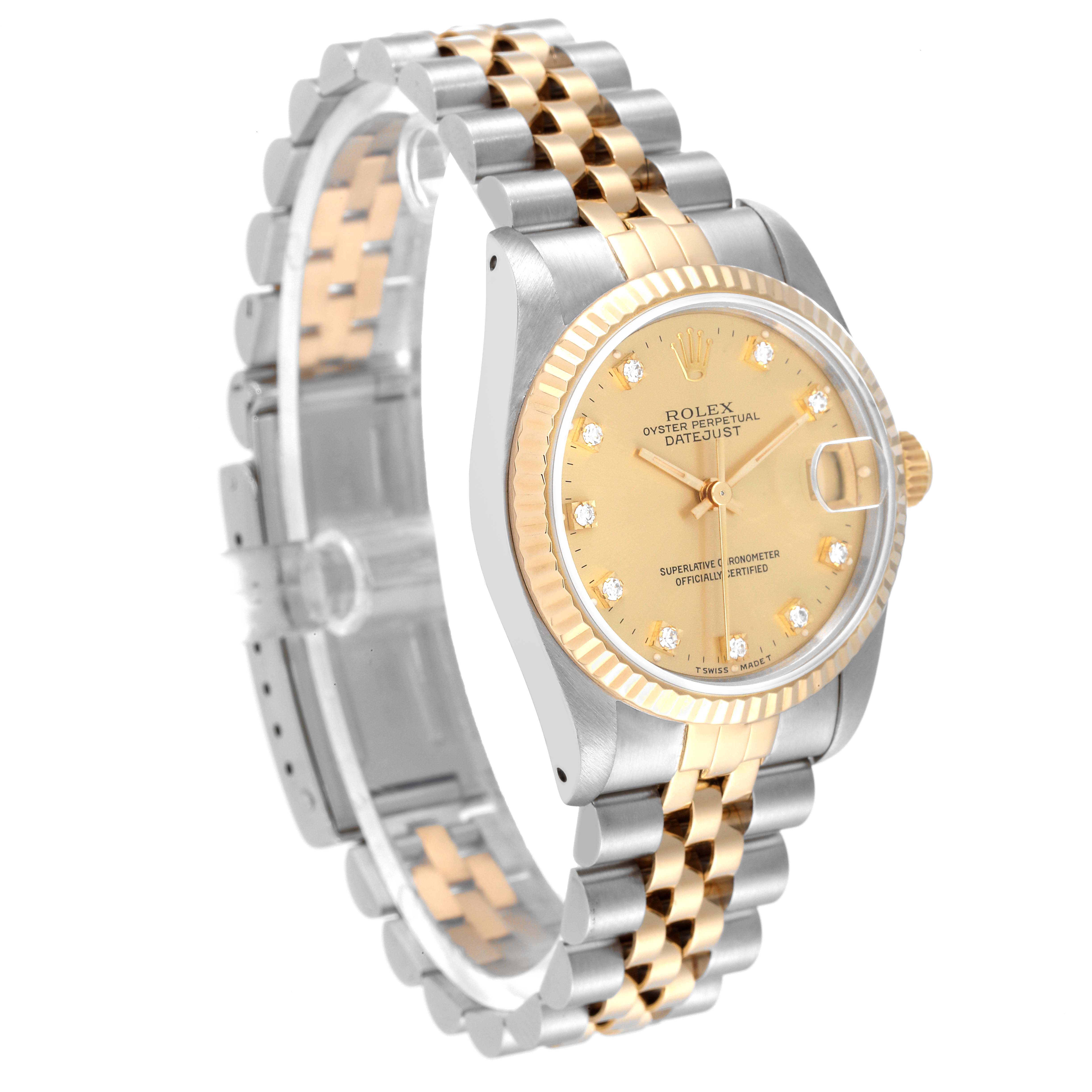 The image shows a side angle view of a Rolex Mid-Size 68273 Women
s Steel and Gold (two tone) Champagne Dial 68273 Women
s Steel and Gold (two tone) Champagne Dial Datejust watch, highlighting its two-tone bracelet and diamond-encrusted dial.