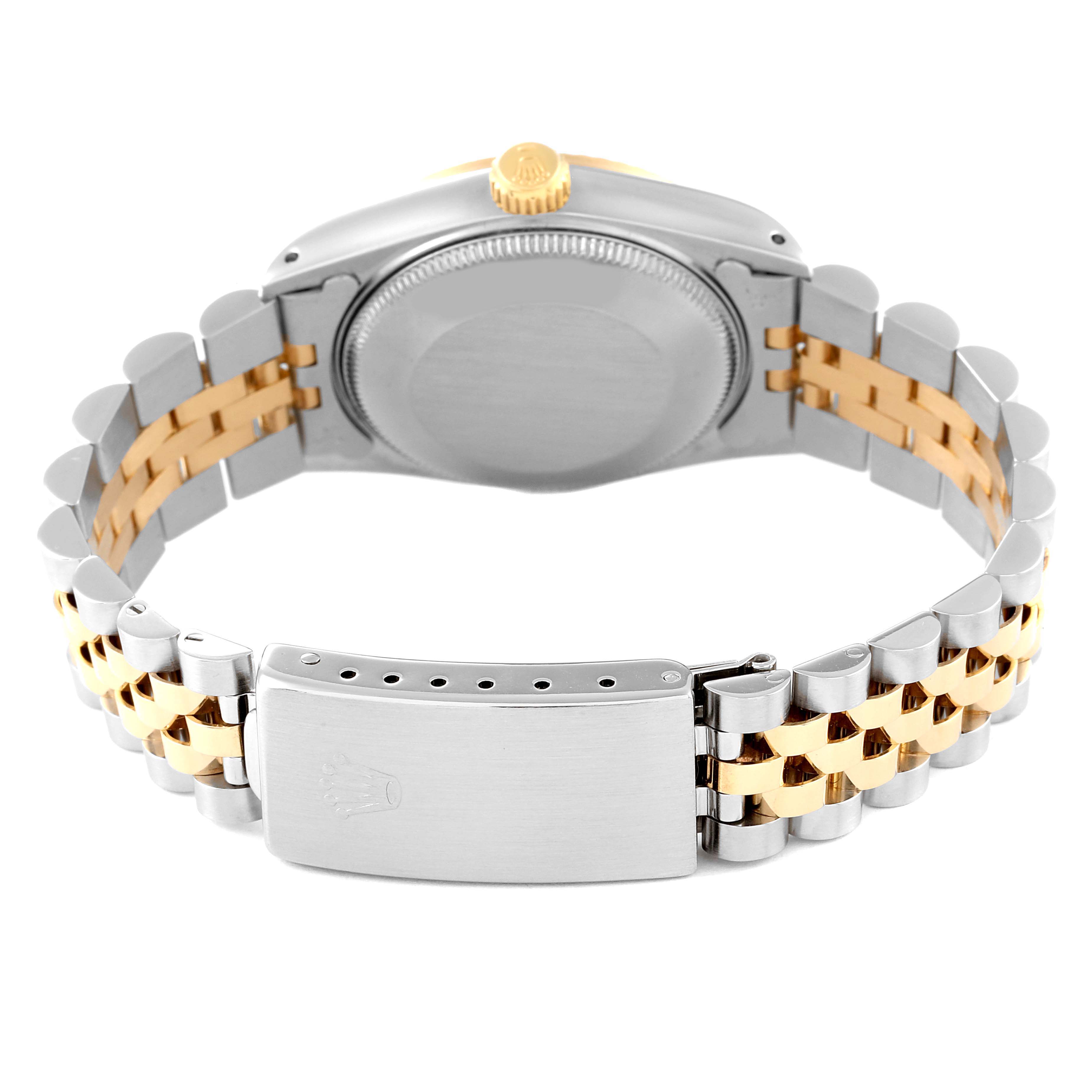 This image shows the back view of a Mid-Size Rolex watch, highlighting the clasp and band.