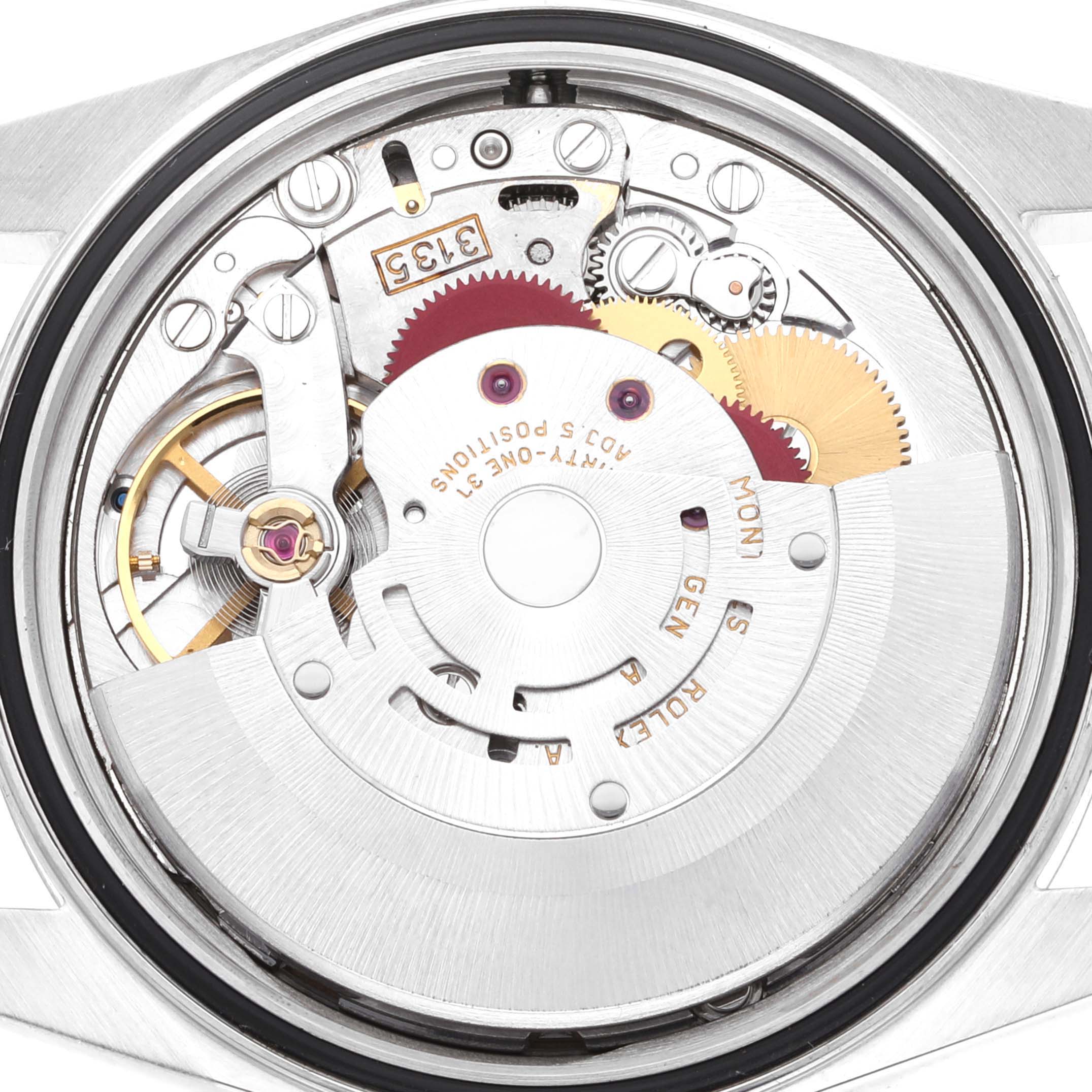 The image shows the movement mechanism of a Rolex Datejust 16234 Men's Stainless Steel White Dial 16234 Men's Stainless Steel White Dial watch from the back, detailing its intricate components and gears.