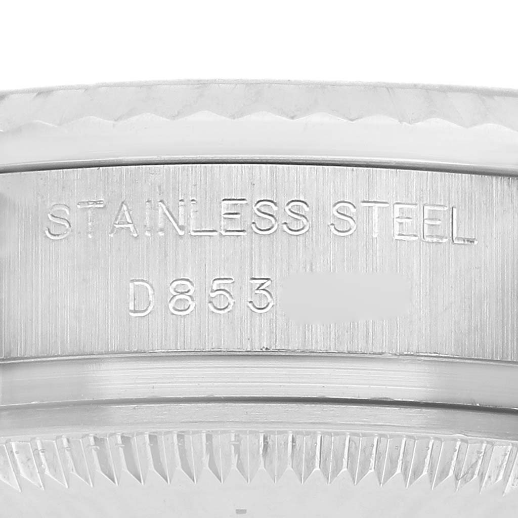 The image shows a close-up of the side engraving and bezel of a Rolex Datejust 179174 Women's Stainless Steel Silver Dial 179174 Women's Stainless Steel Silver Dial 179174.