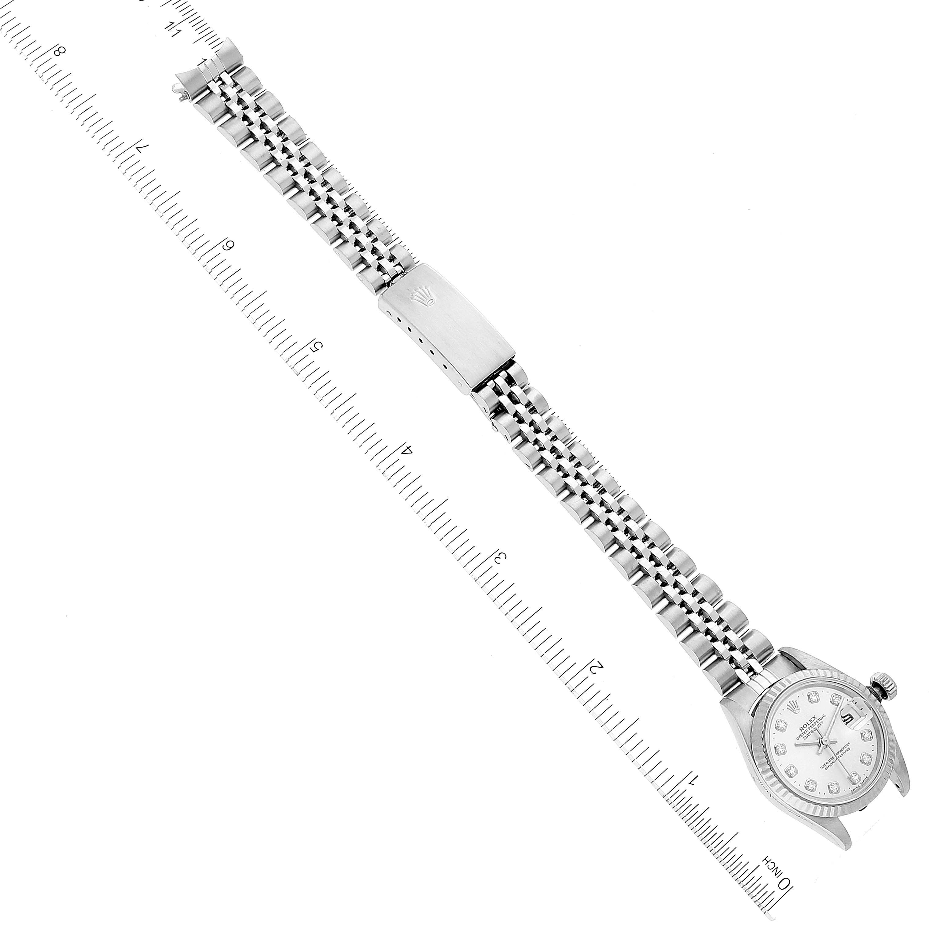 The image shows a top-down view of a Rolex Datejust 69174 Women's Stainless Steel Silver Dial 69174 Women's Stainless Steel Silver Dial watch, featuring the entire watch including the dial, bracelet, and clasp.