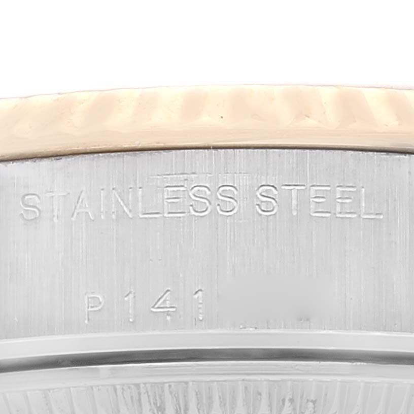 This close-up image shows the stainless steel casing and part of the bezel of a Rolex Datejust 79173 Women's Steel and Gold (two tone) Champagne Dial 79173 Women's Steel and Gold (two tone) Champagne Dial watch.