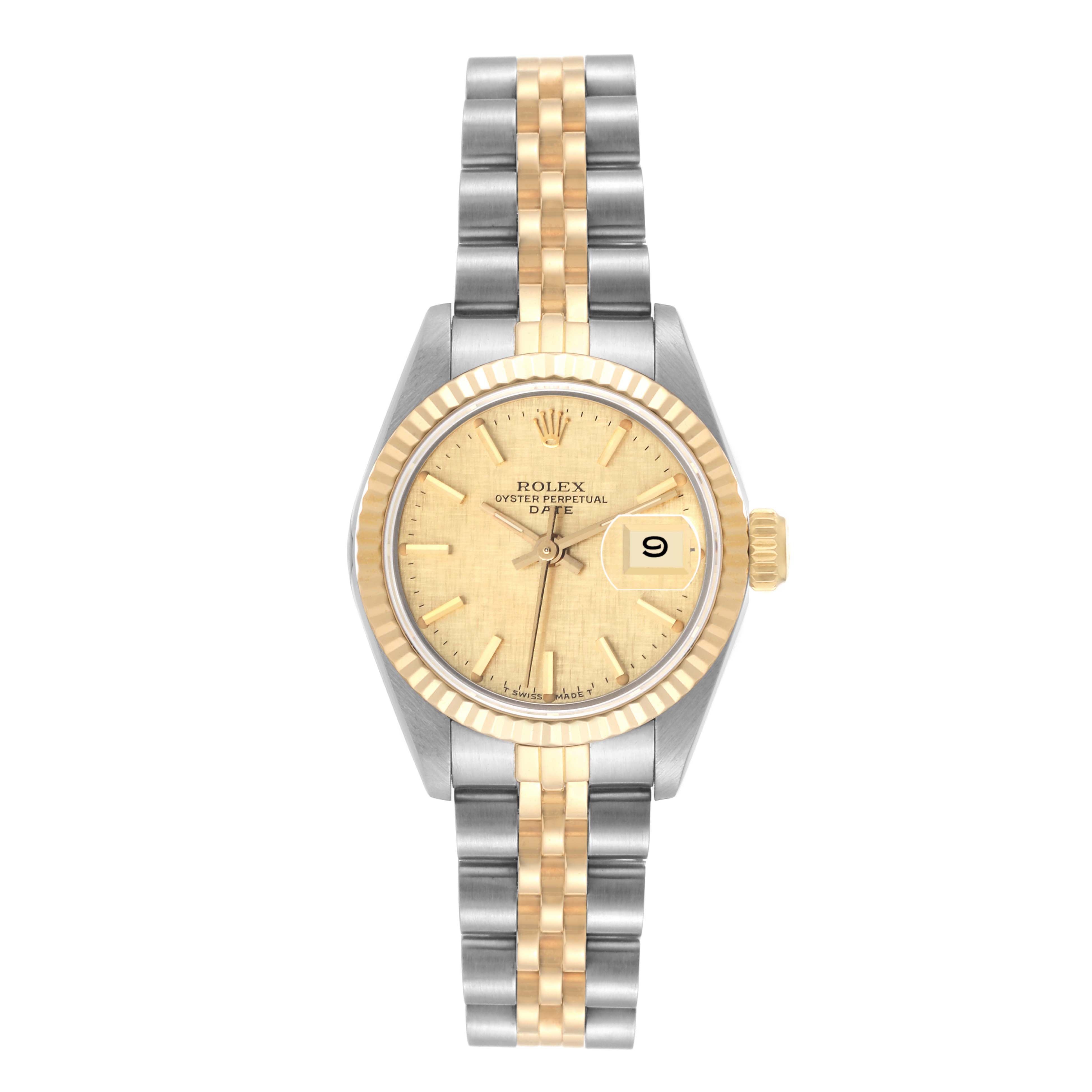 The image shows a Rolex Date 69173 Women's Steel and Gold (two tone) Champagne Dial 69173 Women's Steel and Gold (two tone) Champagne Dial with a two-tone bracelet, gold dial, fluted bezel, and date window at 3 o'clock.