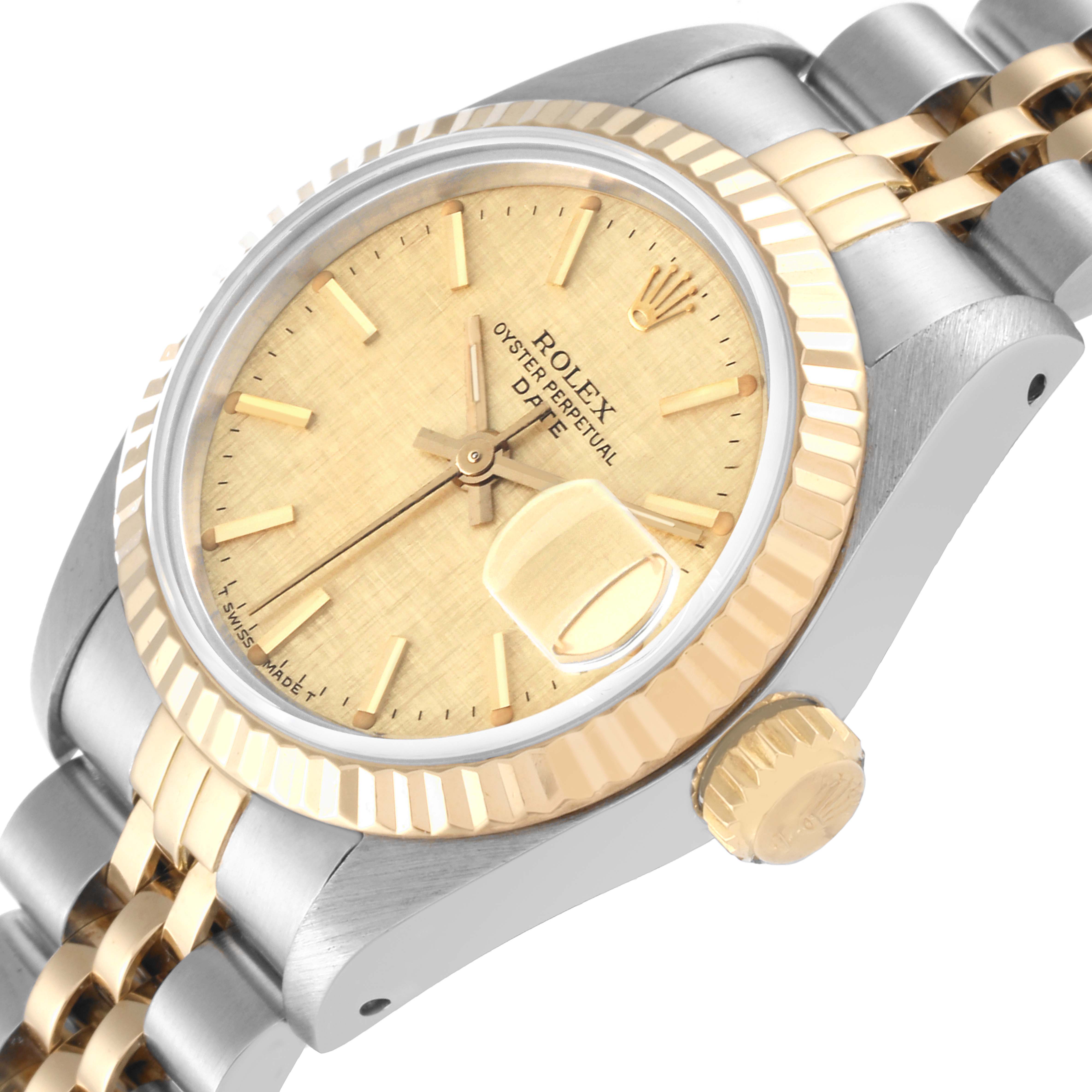 The Rolex Date 69173 Women's Steel and Gold (two tone) Champagne Dial 69173 Women's Steel and Gold (two tone) Champagne Dial model watch is shown at an angled view focusing on the bezel, dial, crown, and partial bracelet.
