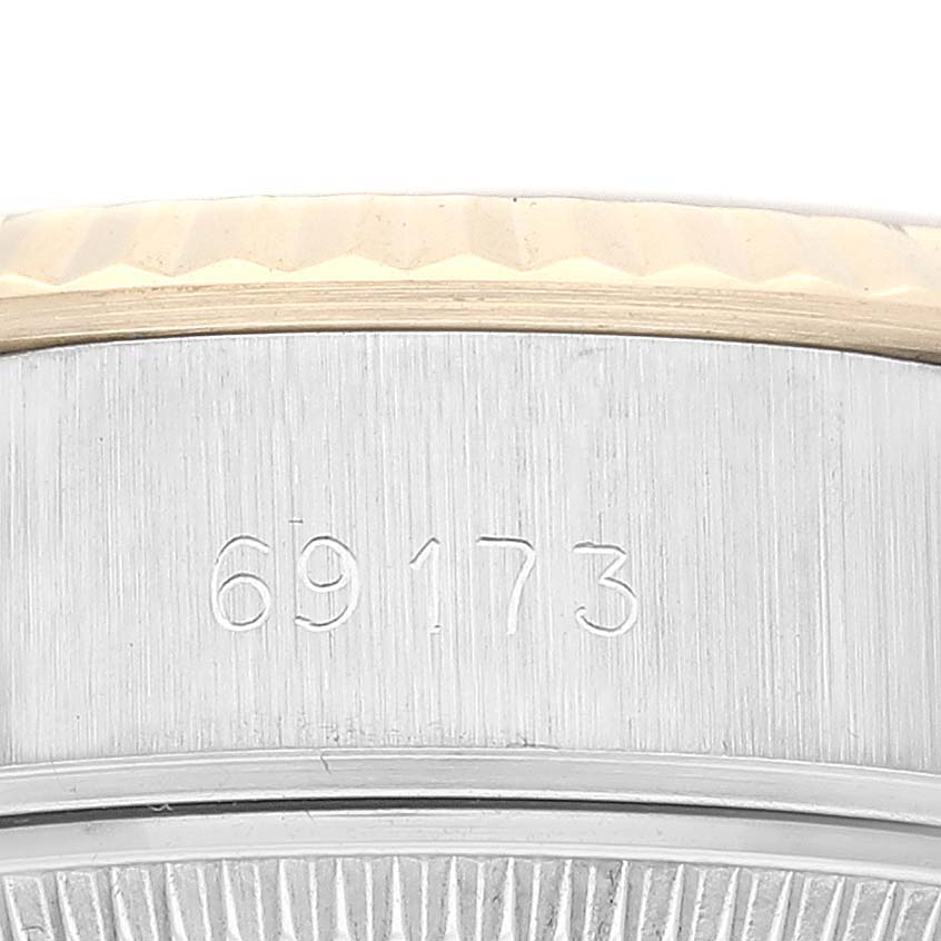 The image shows a close-up of the casing with the engraved model number "69173" of the Rolex Datejust 69173 Women's Steel and Gold (two tone) Champagne Dial 69173 Women's Steel and Gold (two tone) Champagne Dial watch.