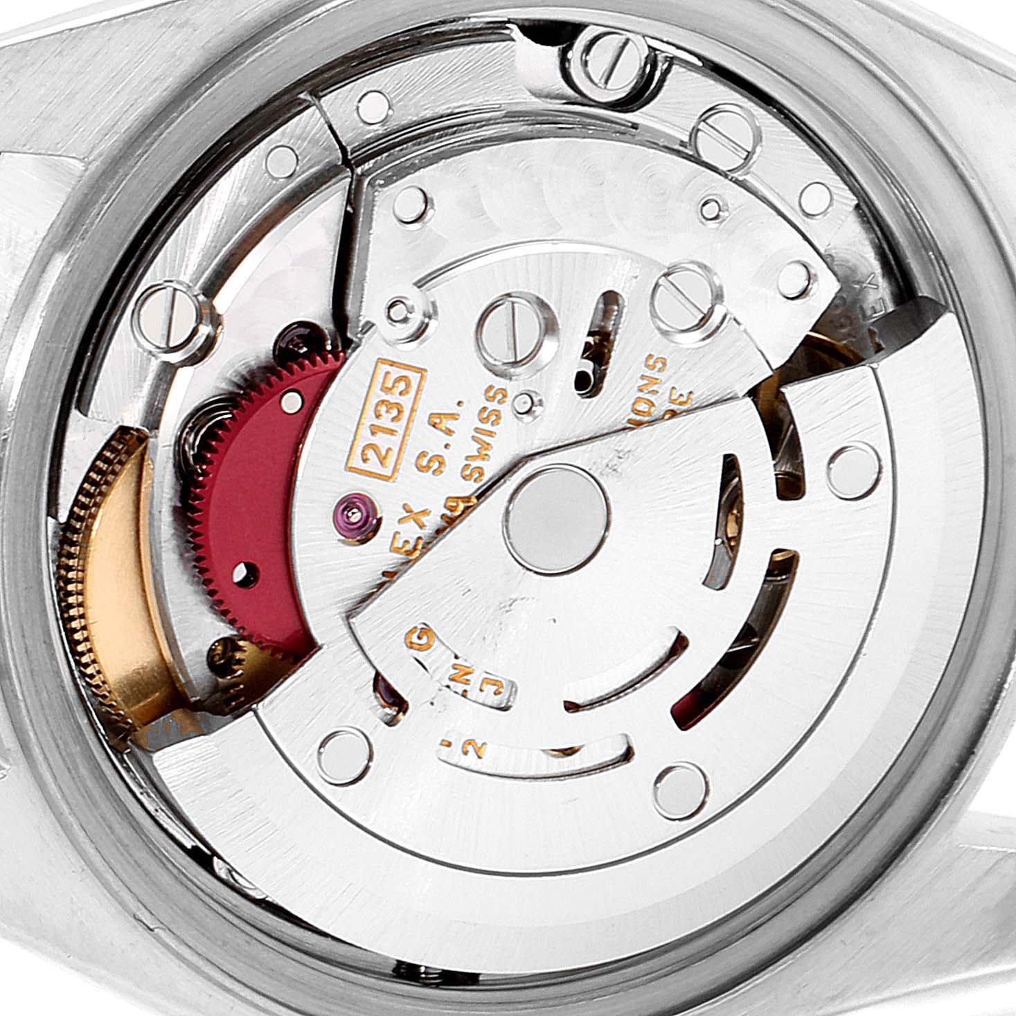 This is a close-up view of the movement mechanism inside a Rolex Datejust 69173 Women's Steel and Gold (two tone) White Dial 69173 Women's Steel and Gold (two tone) White Dial watch.