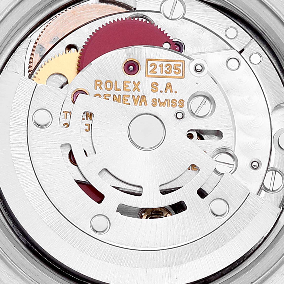 The image shows a close-up of the intricate movement mechanism inside a Rolex Datejust 69173 Women's Steel and Gold (two tone) Beige Dial 69173 Women's Steel and Gold (two tone) Beige Dial watch.