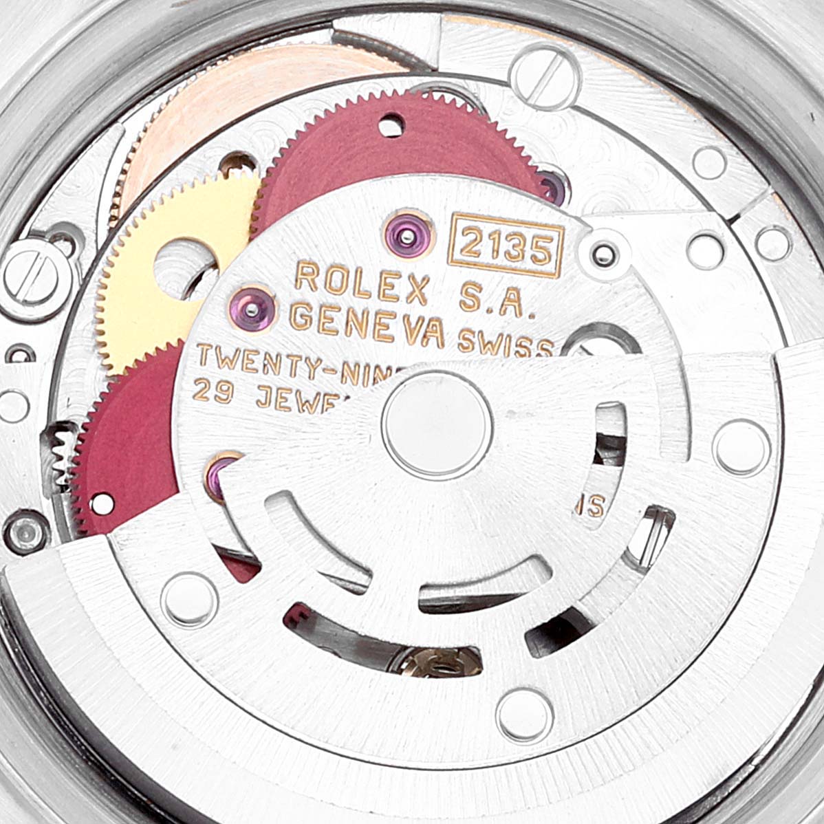 The image shows the internal movement parts of a Rolex Datejust 69173 Women's Steel and Gold (two tone) Beige Dial 69173 Women's Steel and Gold (two tone) Beige Dial model, including gears and inscriptions.