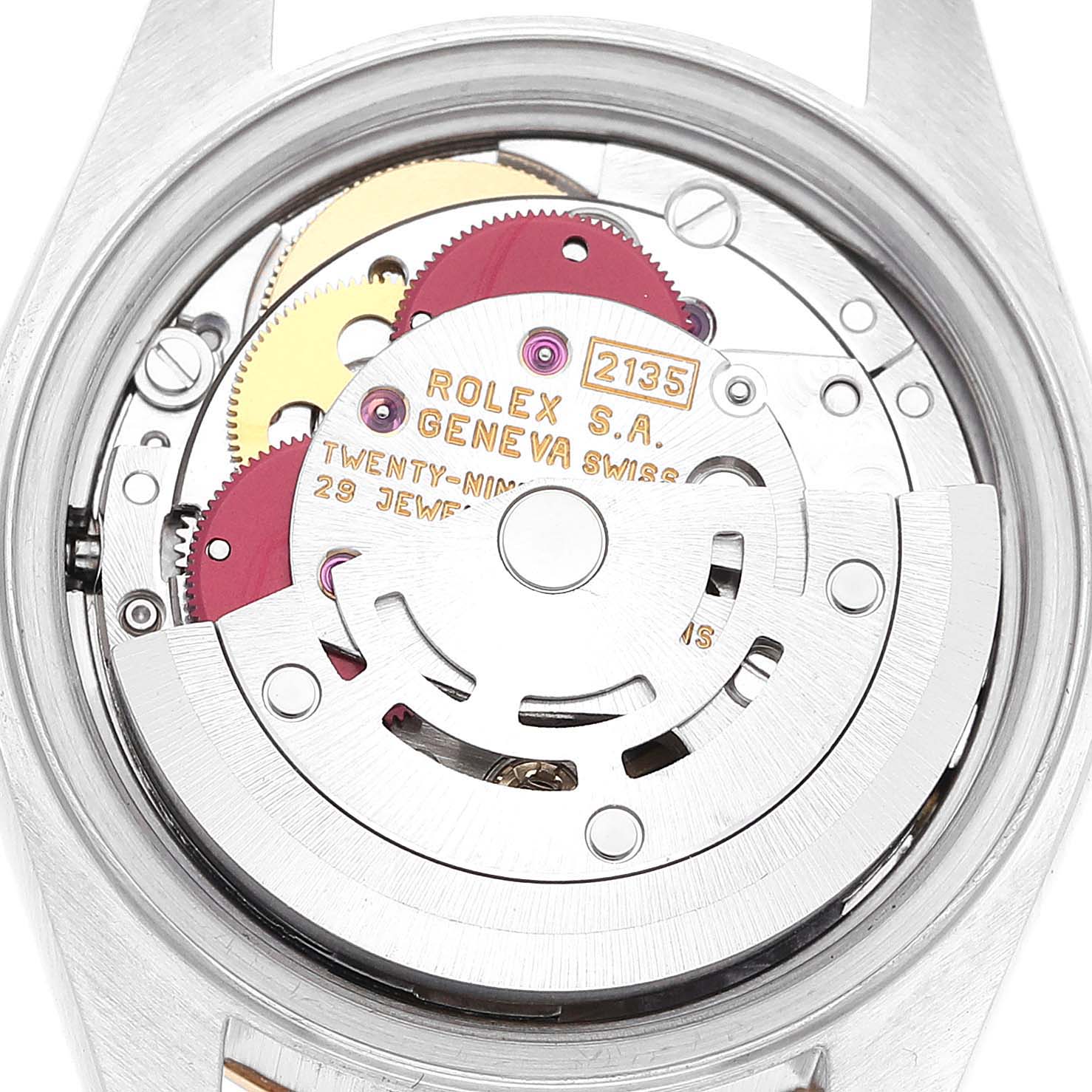 The image shows the internal mechanism of a Rolex Datejust 69163 Women's Steel and Gold (two tone) White Dial 69163 Women's Steel and Gold (two tone) White Dial watch from a rear angle, highlighting components like the rotor and gears.