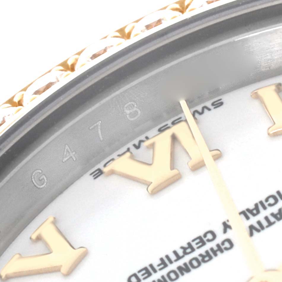 The image shows a close-up of the Rolex Datejust 179383 Women's Steel and Gold (two tone) White Dial 179383 Women's Steel and Gold (two tone) White Dial watch face, highlighting the Roman numeral and edge of the bezel.