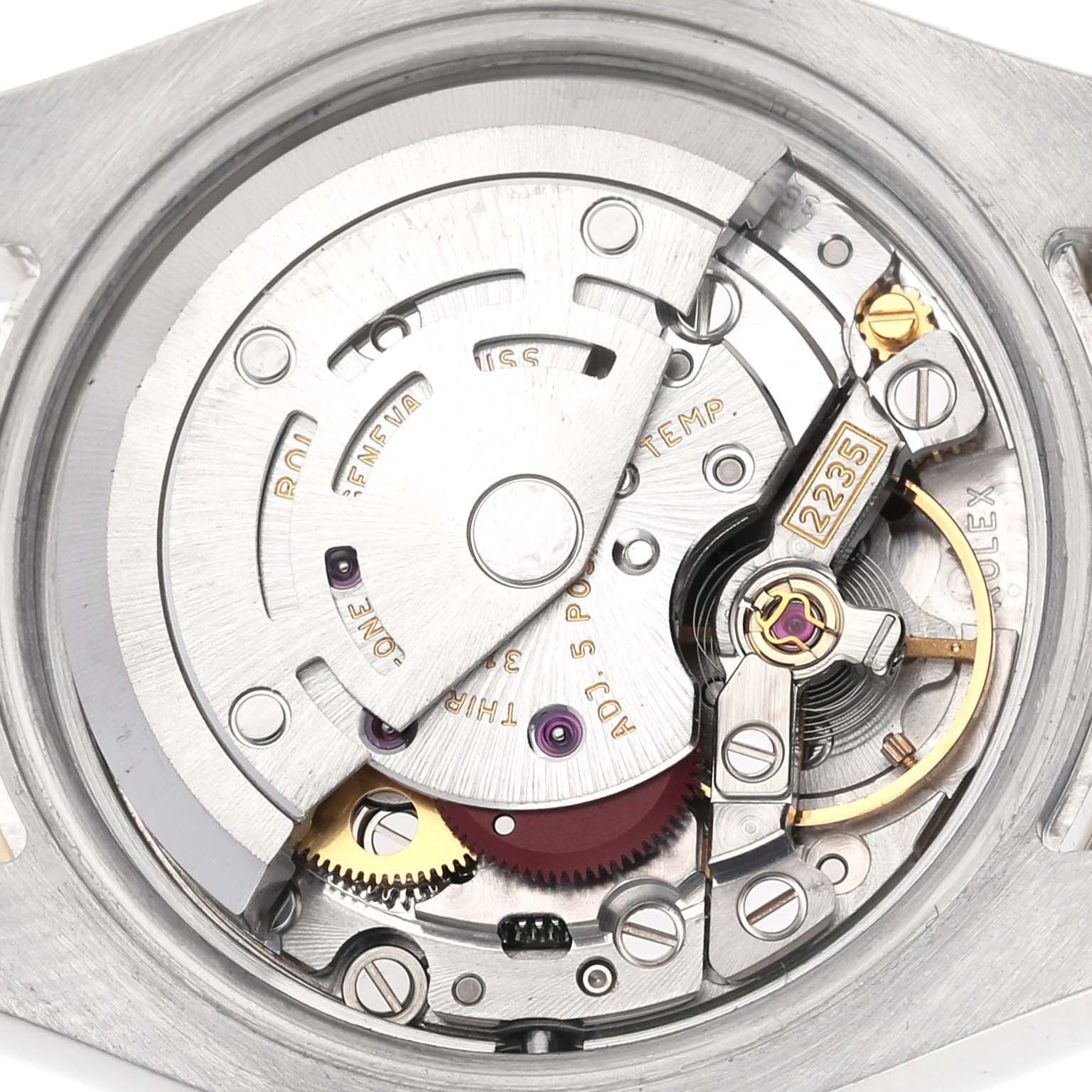 The image shows a close-up of the movement inside a Rolex Datejust 179383 Women's Steel and Gold (two tone) White Dial 179383 Women's Steel and Gold (two tone) White Dial, showcasing gears and internal components.