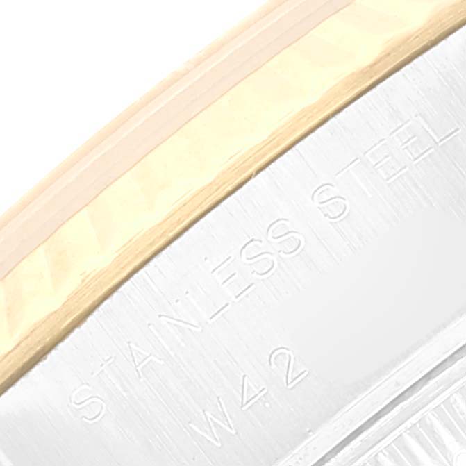 This close-up image shows the band section of the Rolex Datejust 69173 Women's Steel and Gold (two tone) White Dial 69173 Women's Steel and Gold (two tone) White Dial watch, featuring the stainless steel marking.