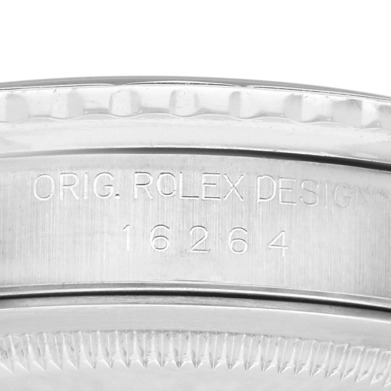 The image shows a close-up view of the side of a Rolex Datejust 16264 Men's Stainless Steel Silver Dial 16264 Men's Stainless Steel Silver Dial watch case, featuring the engraved model number.