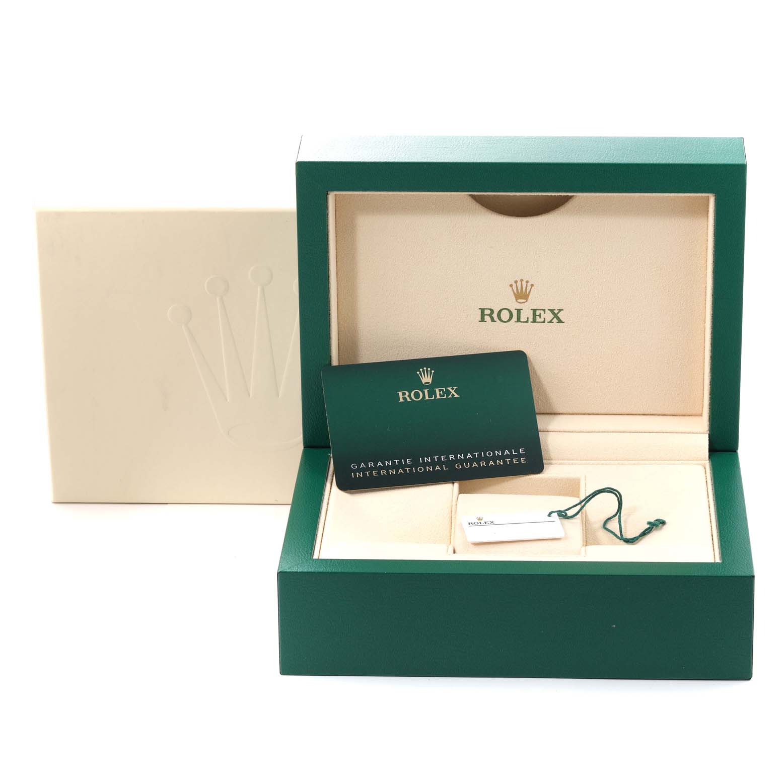 This image shows the open box for a Rolex GMT-Master 126710 Men's Stainless Steel Black Dial 126710 Men's Stainless Steel Black Dial, including the guarantee card and accessories.