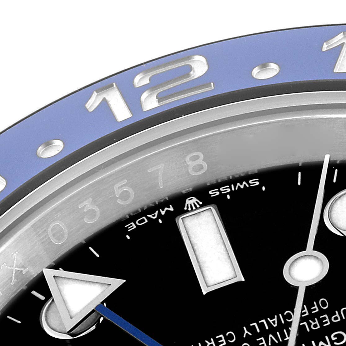 Close-up of the Rolex GMT-Master 126710 Men's Stainless Steel Black Dial 126710 Men's Stainless Steel Black Dial showing part of the blue bezel, numerals, and hands.
