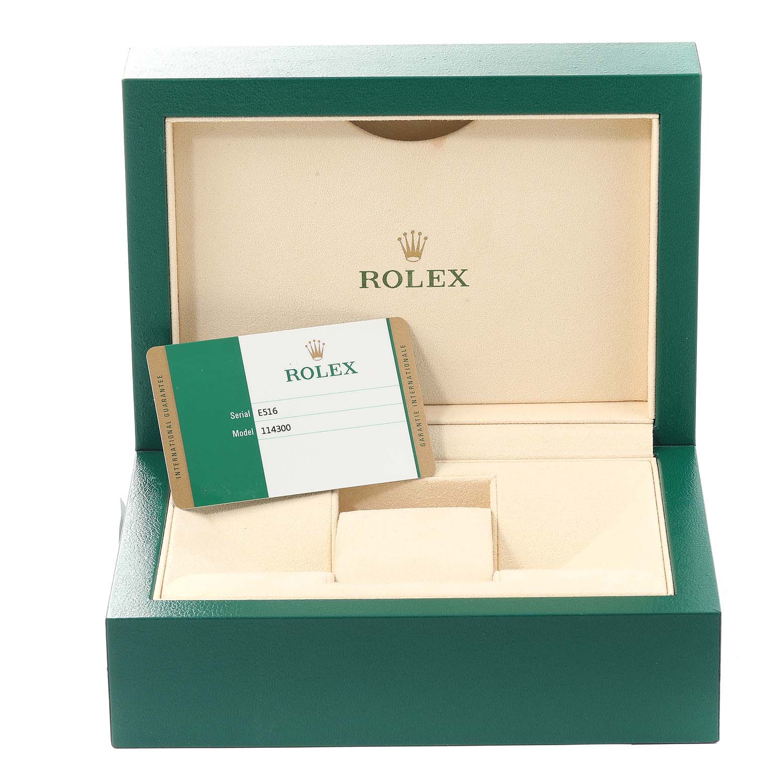The image shows a Rolex Oyster Perpetual 114300 Men's Stainless Steel Black Dial 114300 Men's Stainless Steel Black Dial watch box with a warranty card inside.