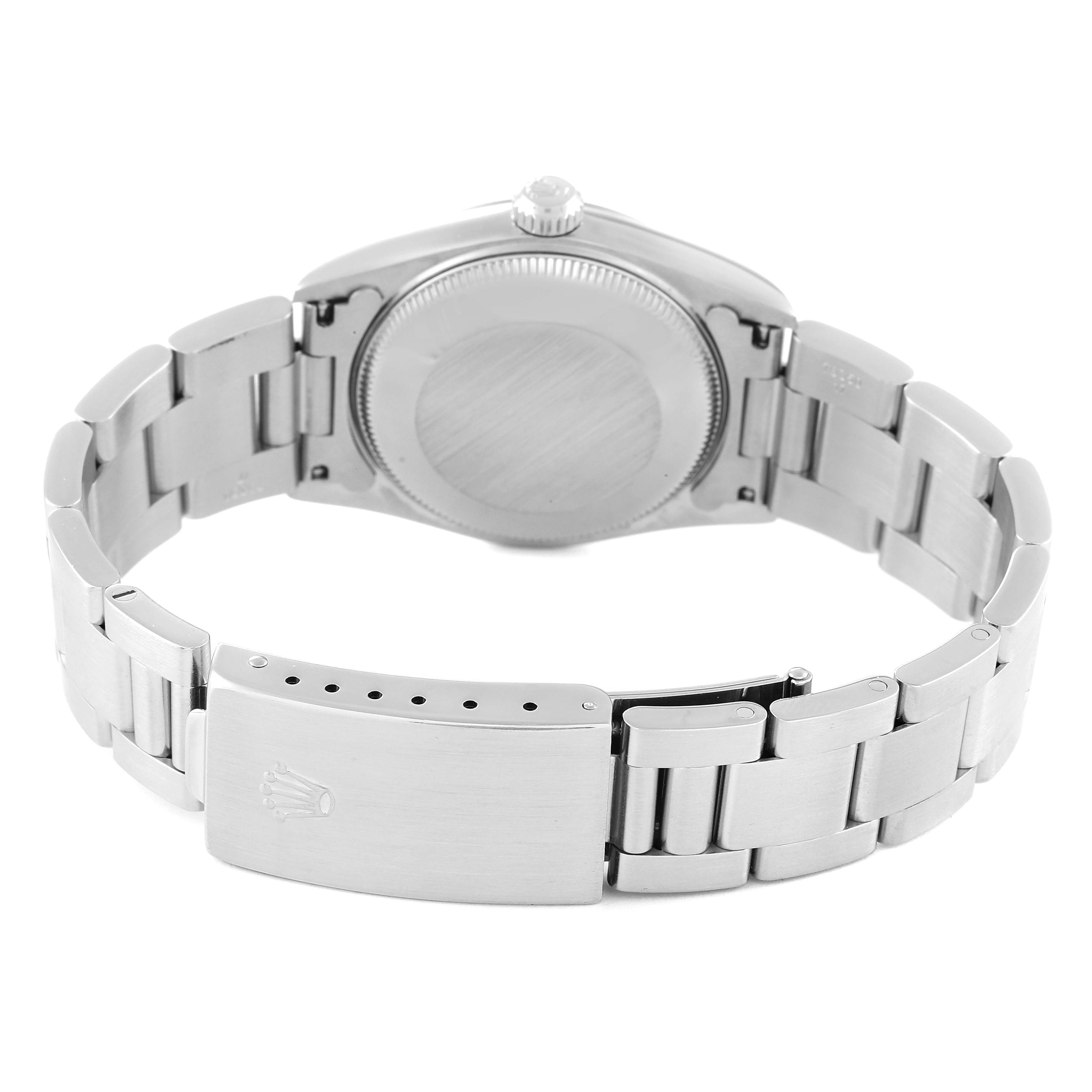 This Mid-Size Rolex watch is shown from the back, displaying the case back, crown, and bracelet with the clasp open.