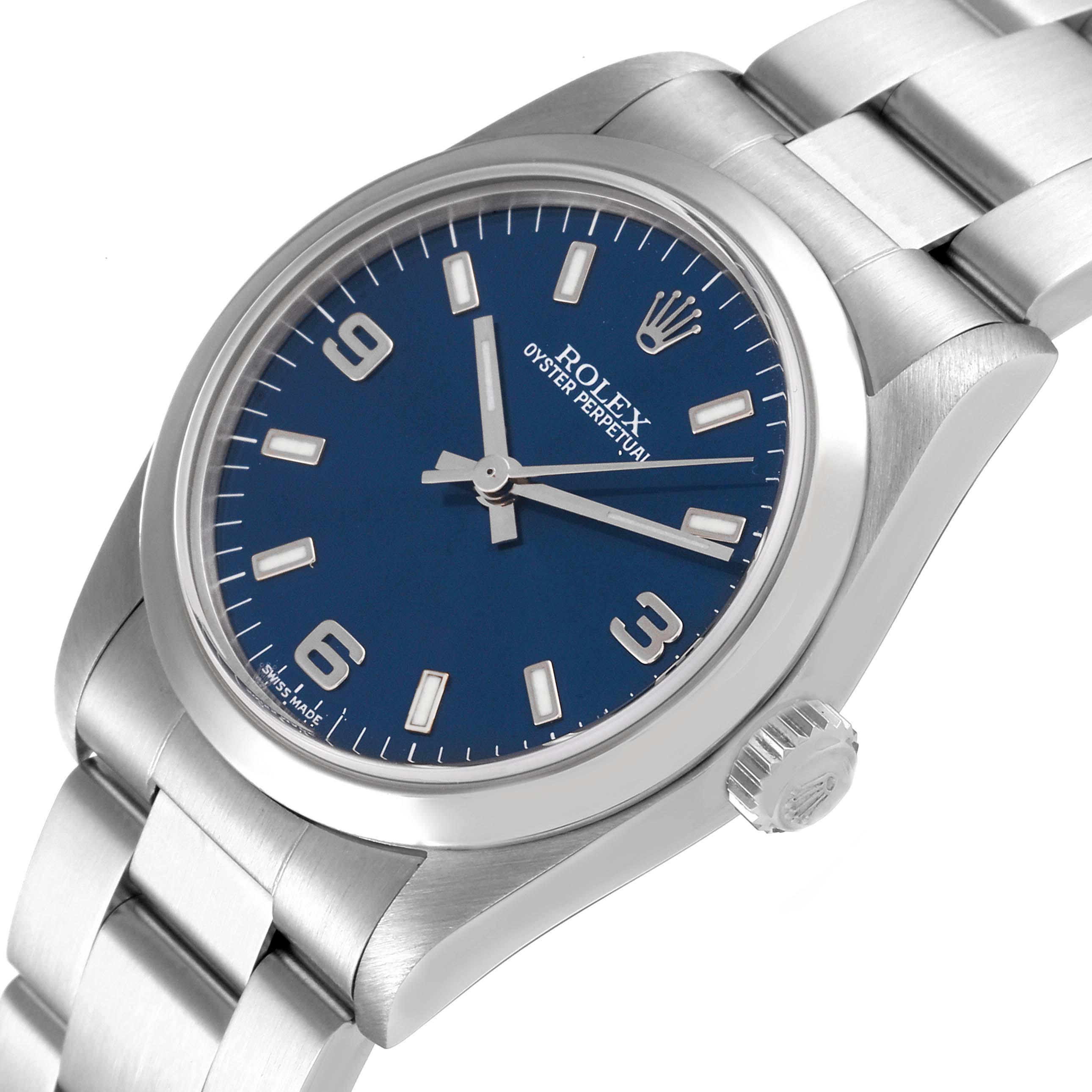The Rolex Mid-Size 77080 Women
s Stainless Steel Blue Dial 77080 Women
s Stainless Steel Blue Dial watch is shown at a slight side view, highlighting the blue dial, crown, bracelet, and numerals.