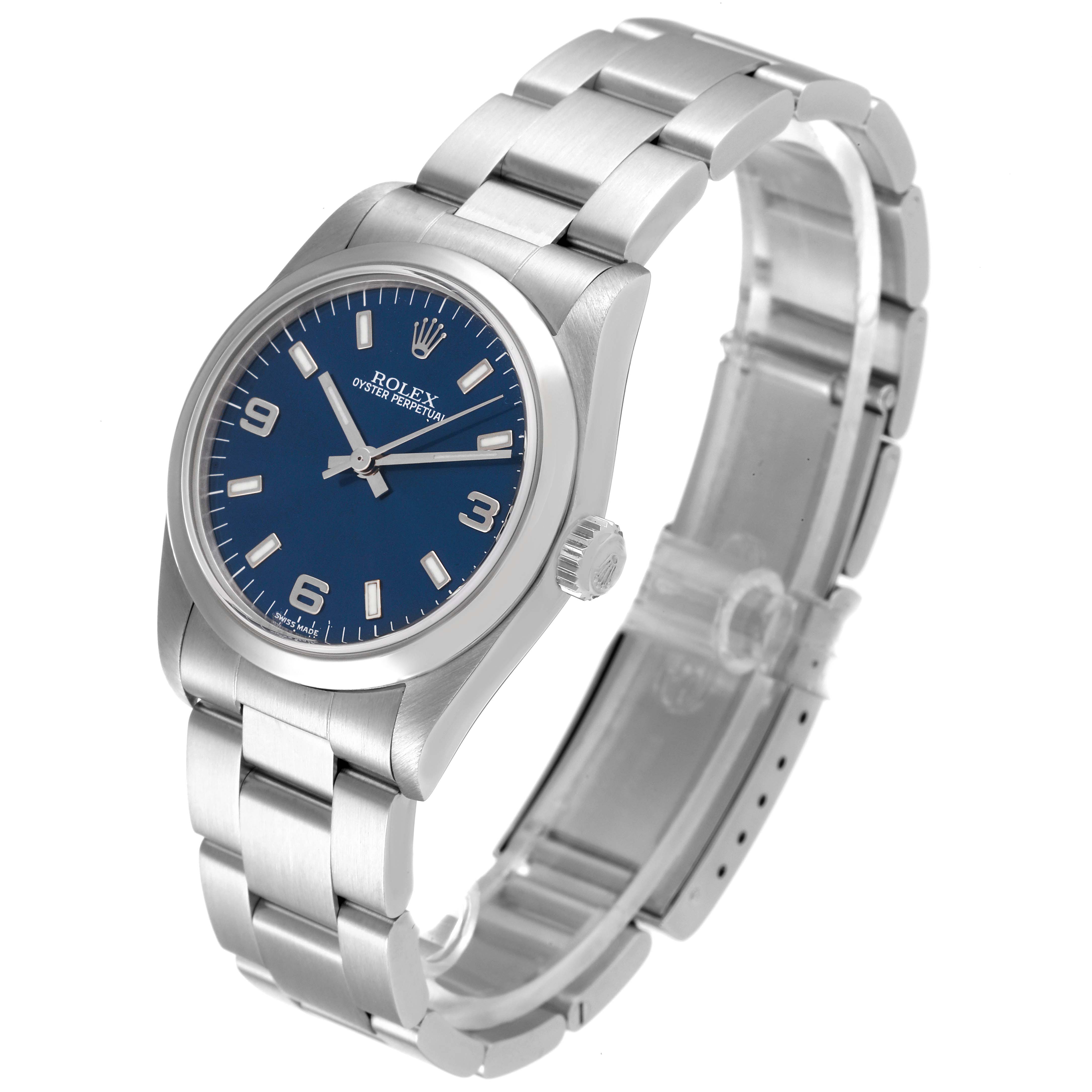 The Rolex Mid-Size 77080 Women
s Stainless Steel Blue Dial 77080 Women
s Stainless Steel Blue Dial watch is shown at a three-quarter angle, displaying the face, crown, and bracelet.