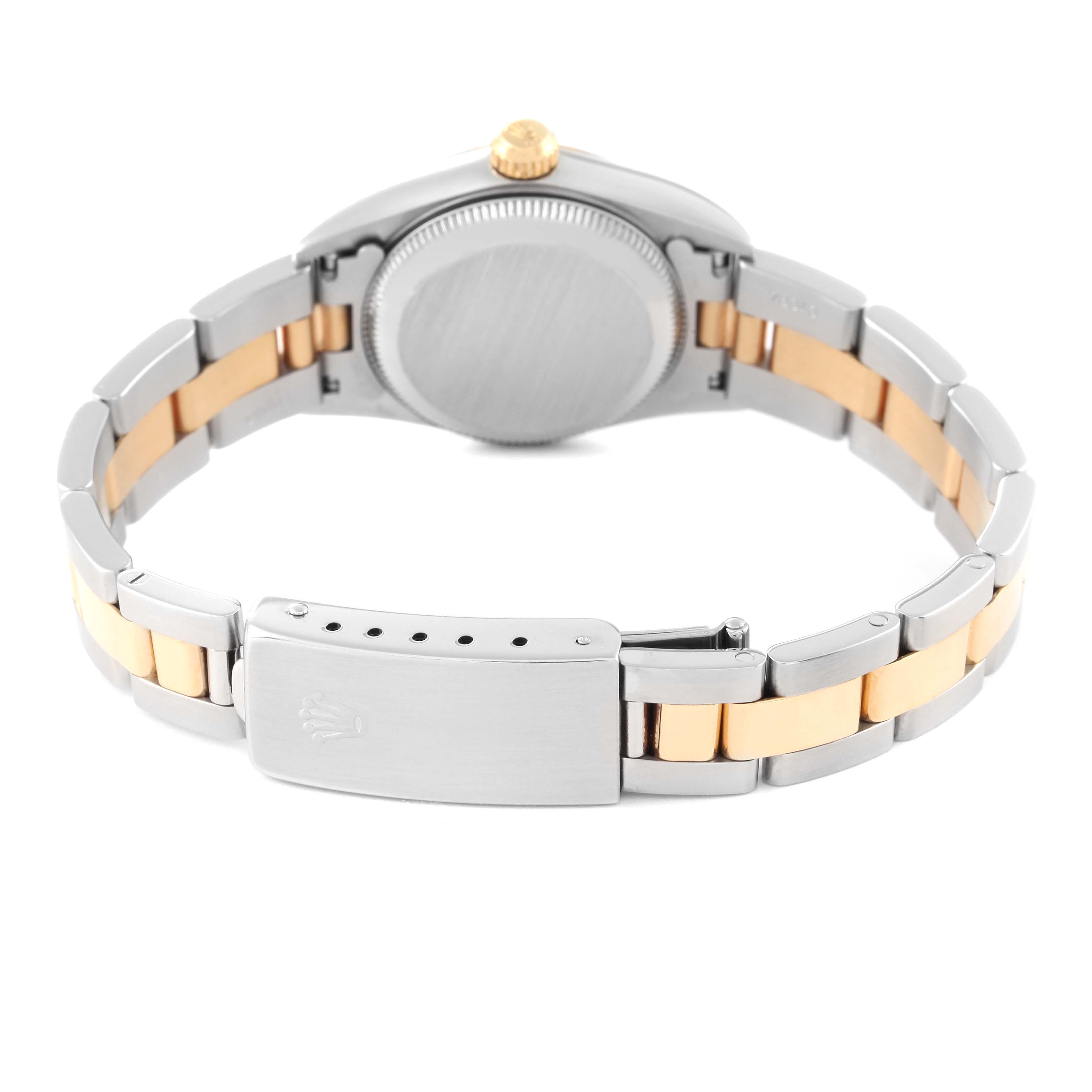 The image shows the back view of a Rolex Oyster Perpetual 76183 Women's Steel and Gold (two tone) Grey Dial 76183 Women's Steel and Gold (two tone) Grey Dial watch, focusing on the case back and the two-tone metal bracelet with a clasp.