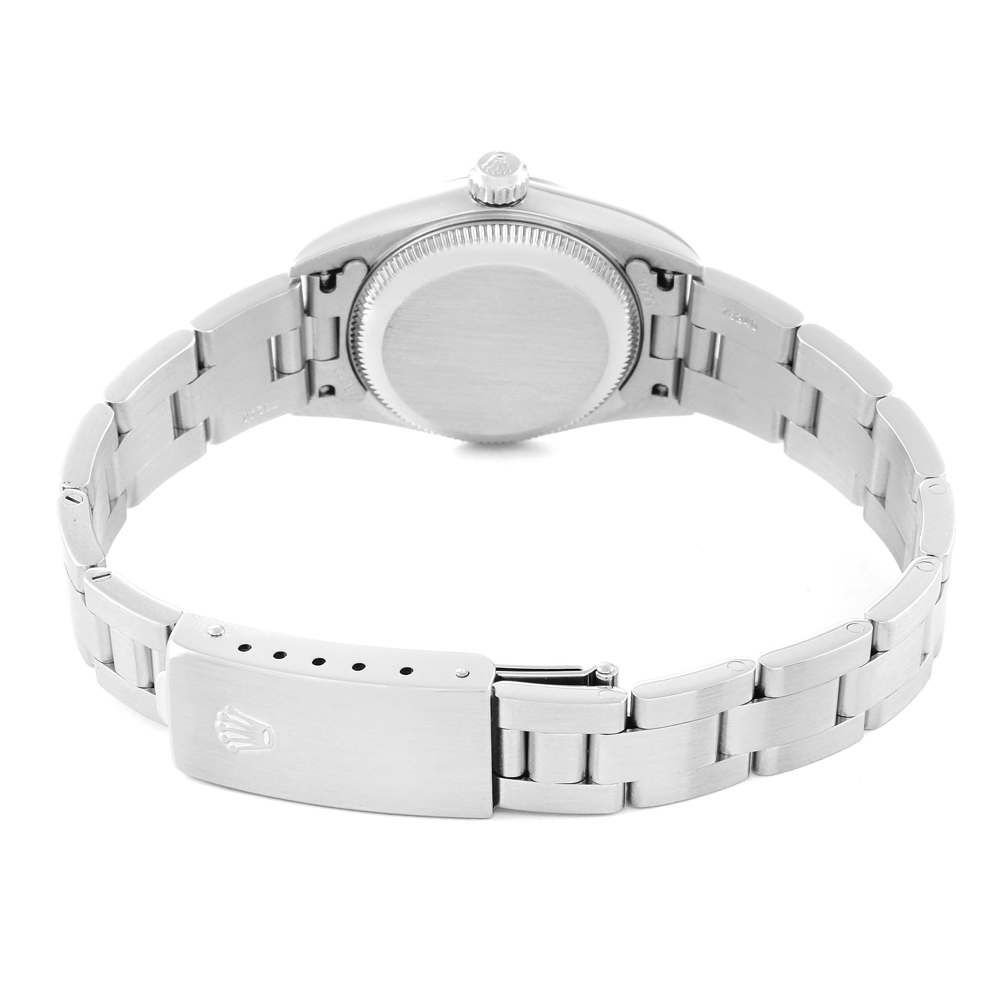 The image shows the back view of a Rolex Oyster Perpetual 76080 Women
s Stainless Steel Pink Dial 76080 Women
s Stainless Steel Pink Dial watch, highlighting the clasp, bracelet, and caseback.