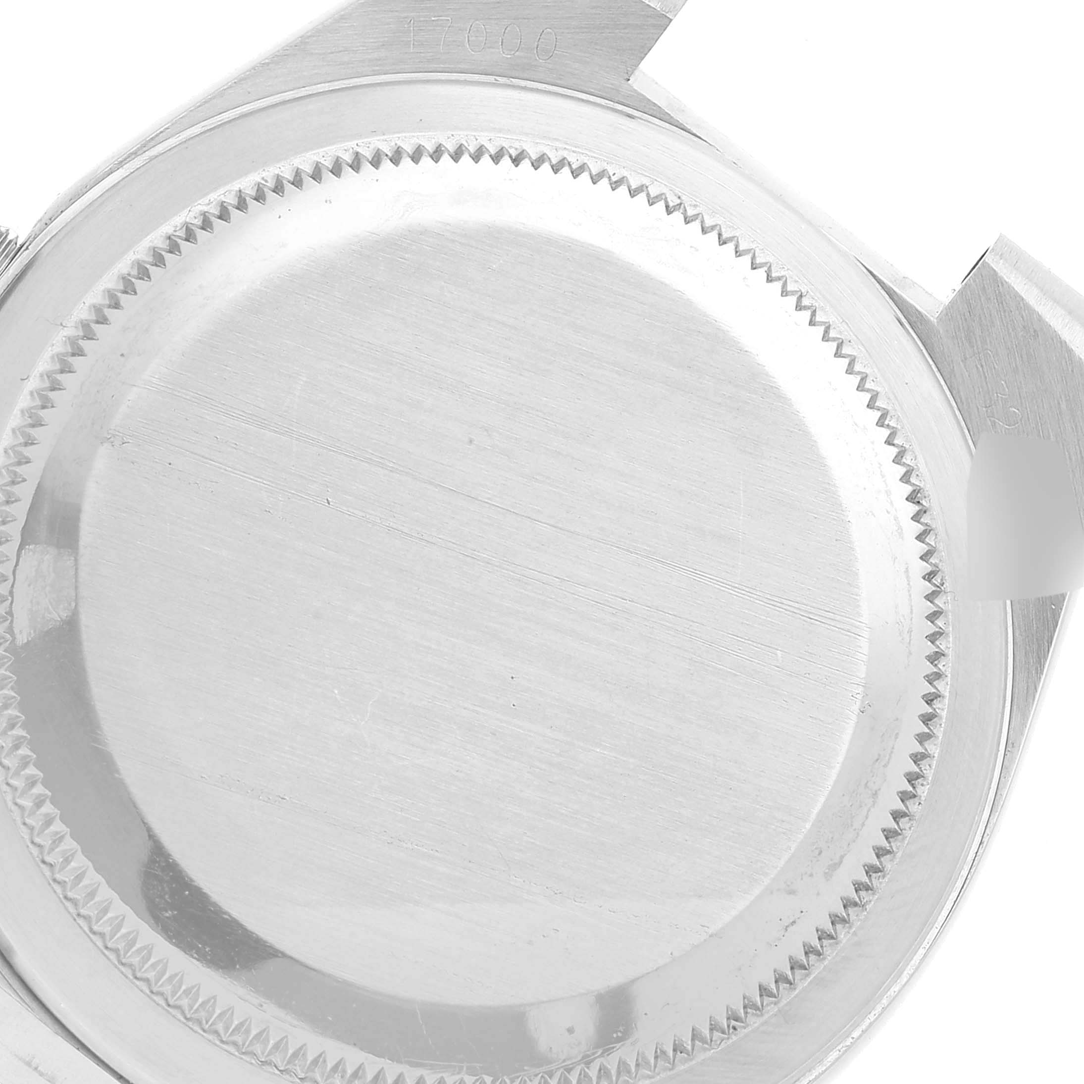 This image shows a close-up of the back case of a Rolex Oysterquartz 17000 Men's Stainless Steel Blue Dial 17000 Men's Stainless Steel Blue Dial watch.