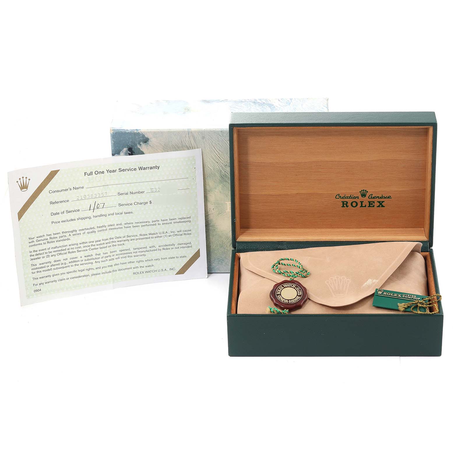 The image shows a Rolex Oysterquartz 17000 Men's Stainless Steel Blue Dial 17000 Men's Stainless Steel Blue Dial box, warranty card, and accessories such as a tag and cloth from a front angle.