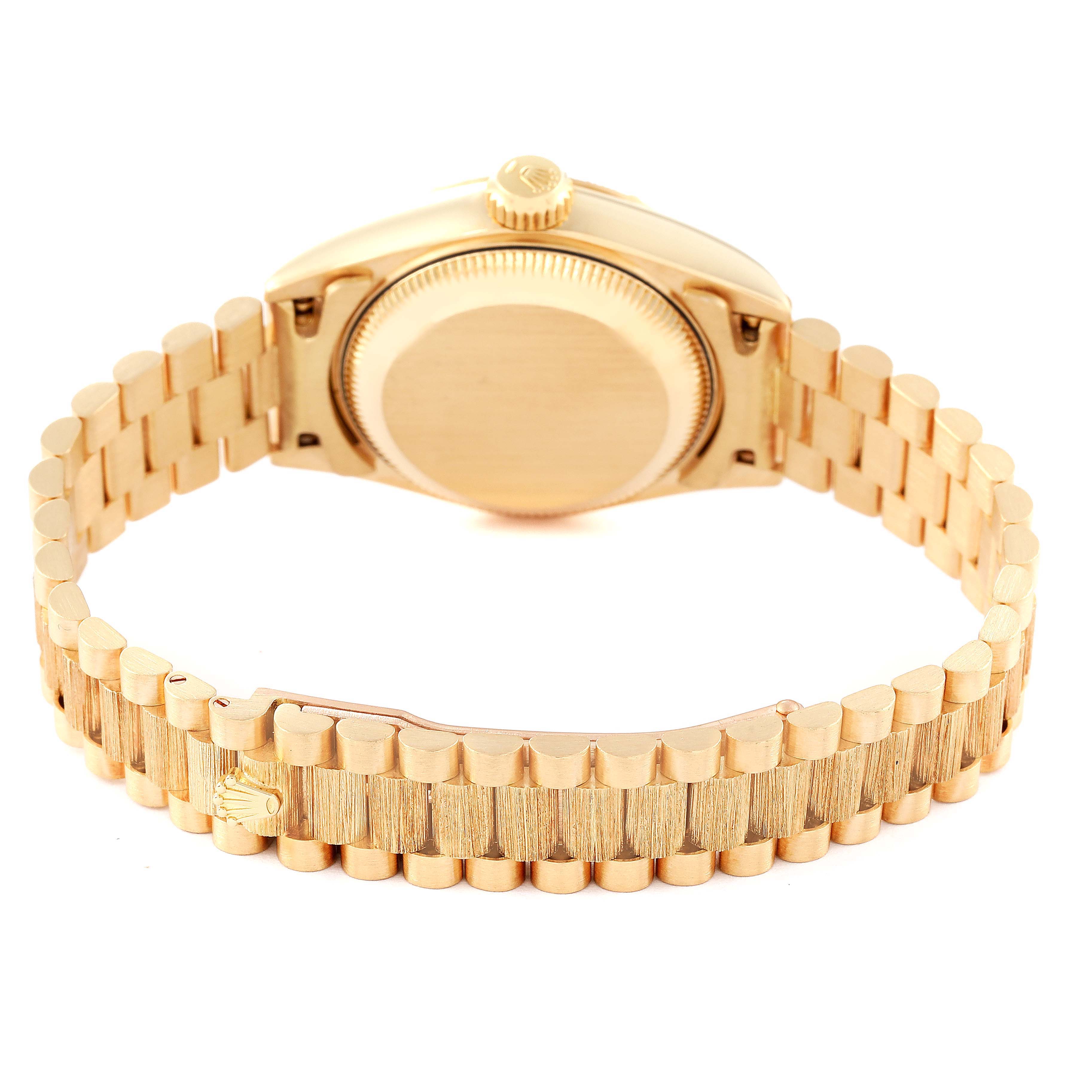 This image shows the back view of the Rolex President 69278 Women's Yellow Gold Champagne Dial 69278 Women's Yellow Gold Champagne Dial model watch, highlighting the case back and the bracelet.