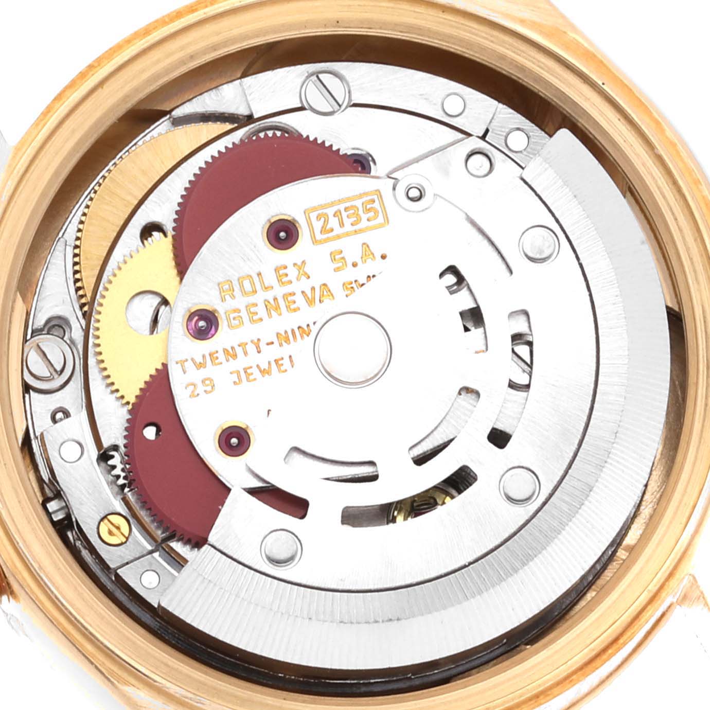 The image shows the internal mechanism of a Rolex President 69278 Women's Yellow Gold Champagne Dial 69278 Women's Yellow Gold Champagne Dial model watch, focusing on the movement components and gears.