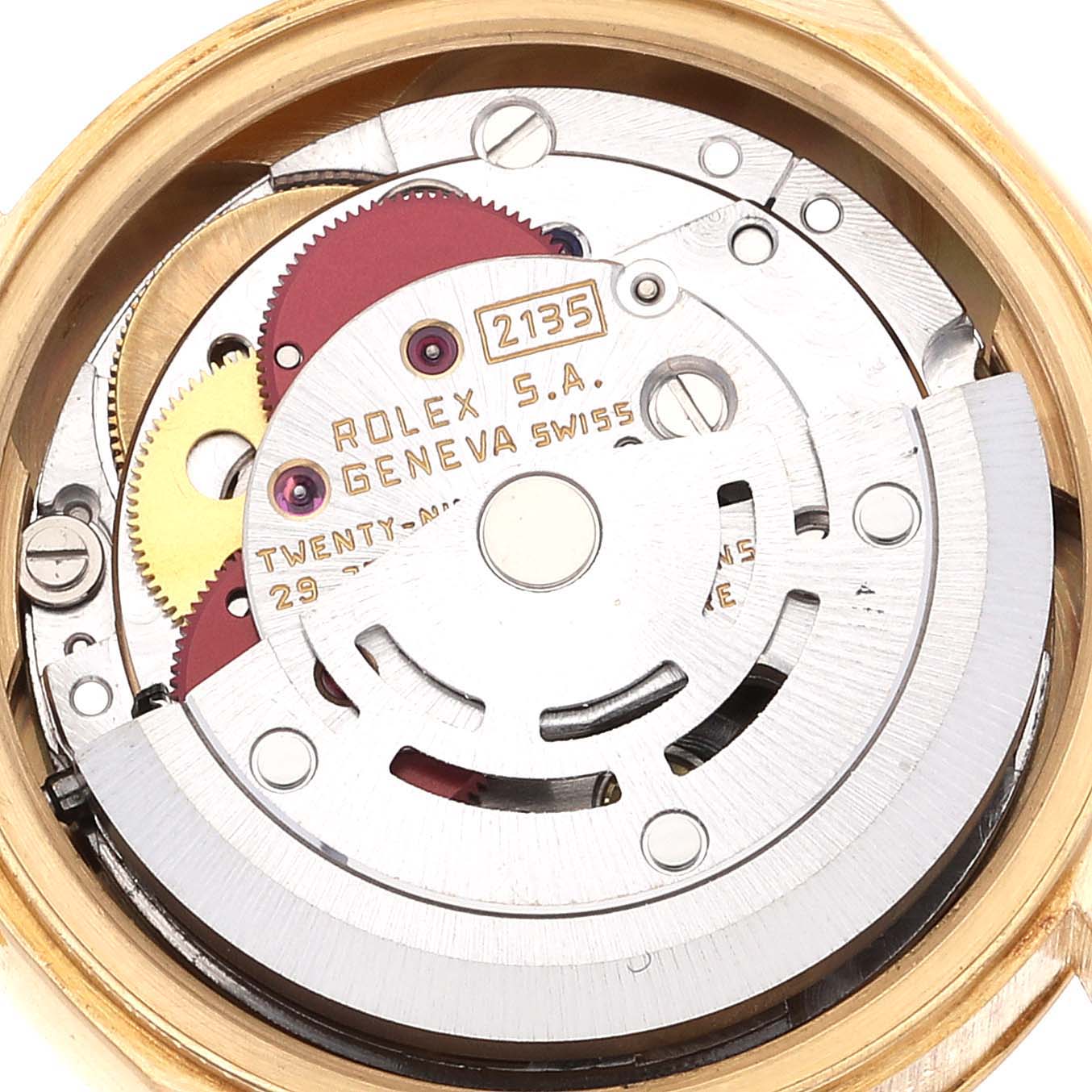The image shows the intricate movement components of a Rolex President 69178 Women's Yellow Gold Champagne Dial 69178 Women's Yellow Gold Champagne Dial model watch from a close-up, top-down angle.