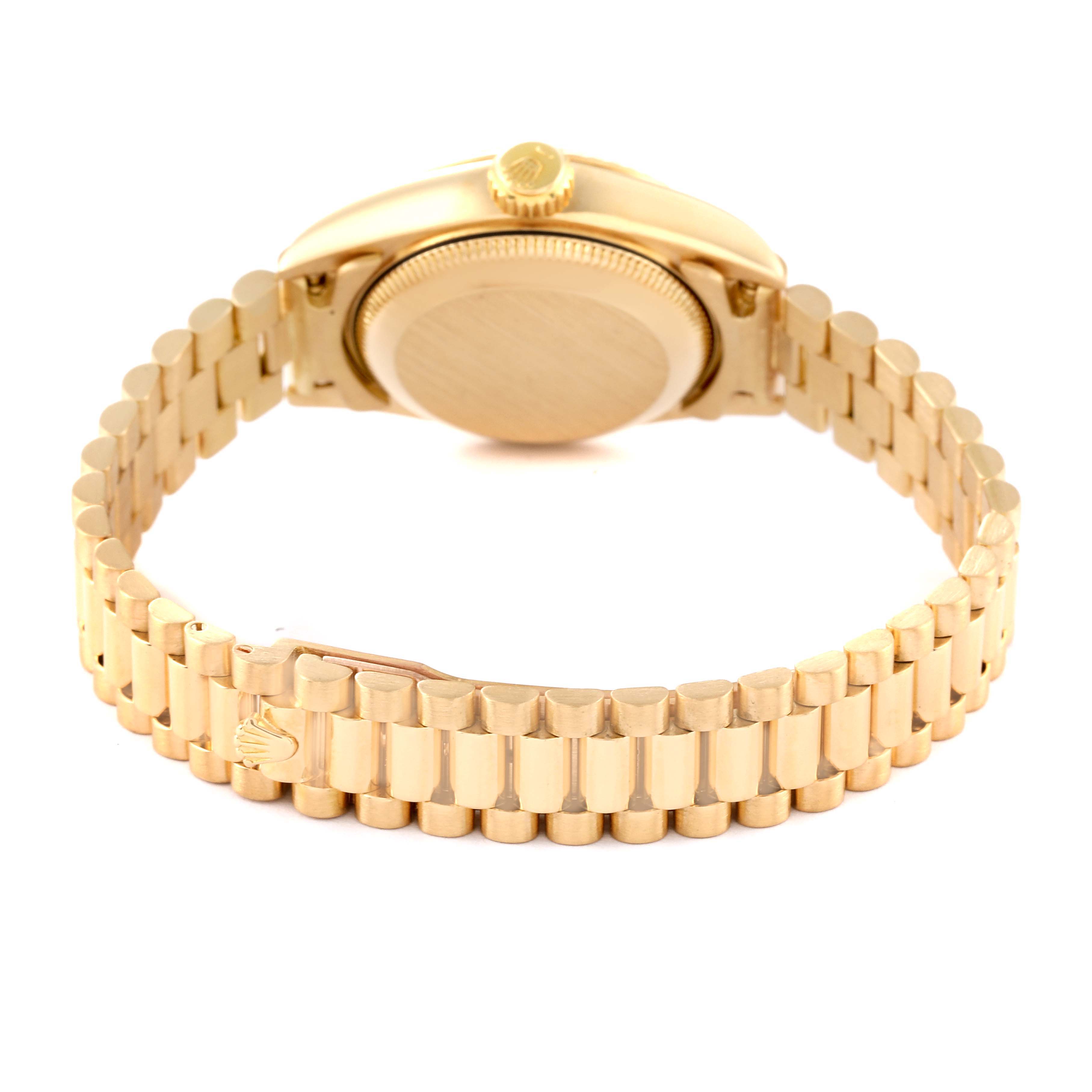 The image shows the back view of a Rolex President 69178 Women's Yellow Gold Champagne Dial 69178 Women's Yellow Gold Champagne Dial model watch, highlighting its gold case and bracelet.