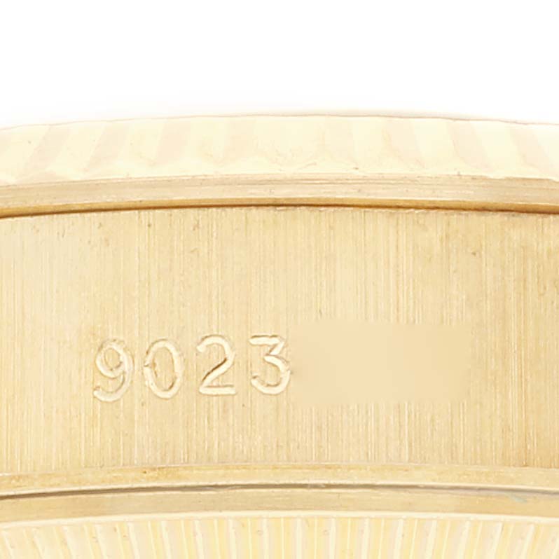 The image shows a close-up of the engraved number on the case side of the Rolex President 69178 Women
s Yellow Gold Champagne Dial 69178 Women
s Yellow Gold Champagne Dial model watch.