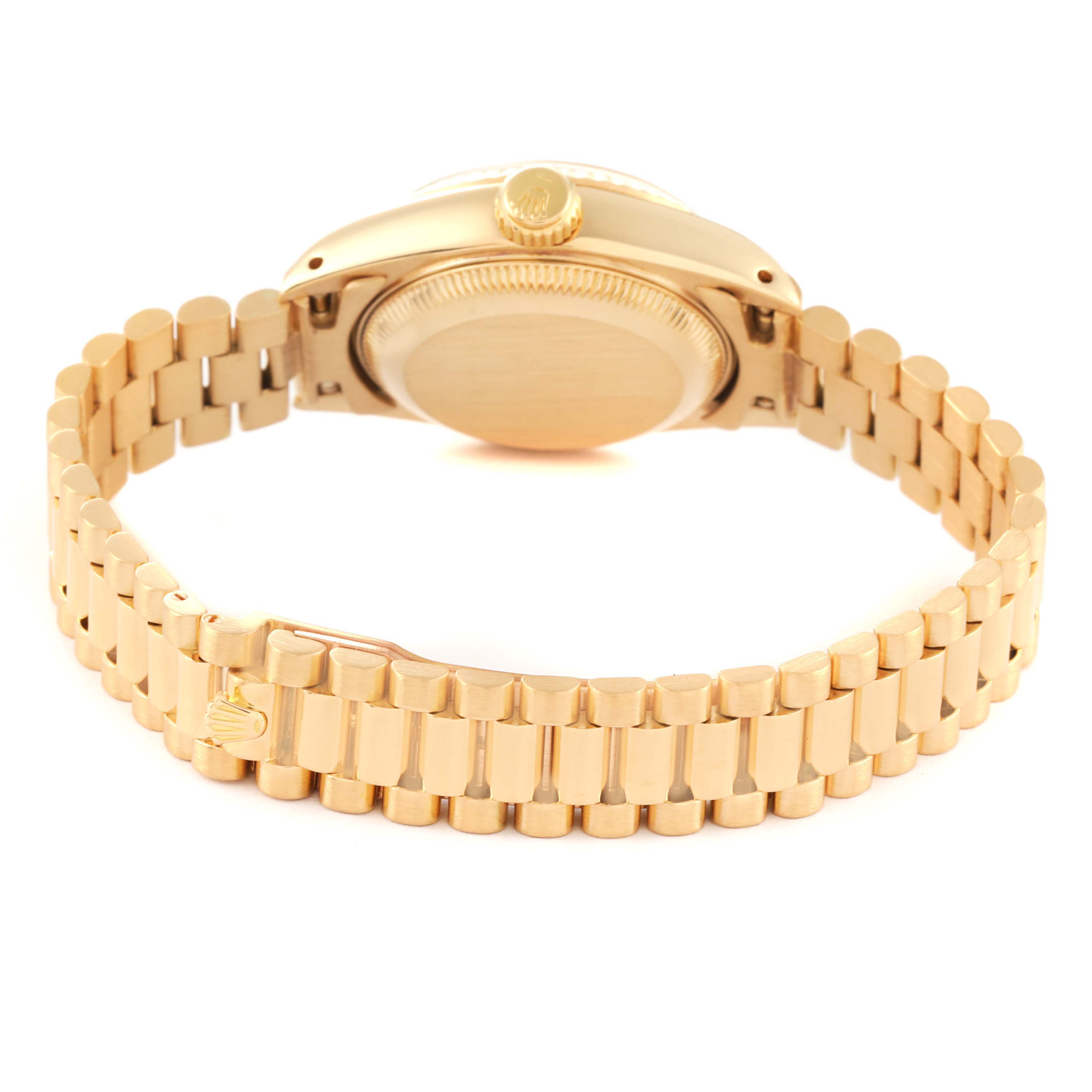 This image shows the back case and bracelet of a Rolex President 69178 Women's Yellow Gold Champagne Dial 69178 Women's Yellow Gold Champagne Dial model watch.