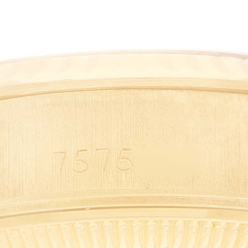 This image shows a close-up of the case side, highlighting the serial number of the Rolex President 69178 Women's Yellow Gold Champagne Dial 69178 Women's Yellow Gold Champagne Dial model watch.