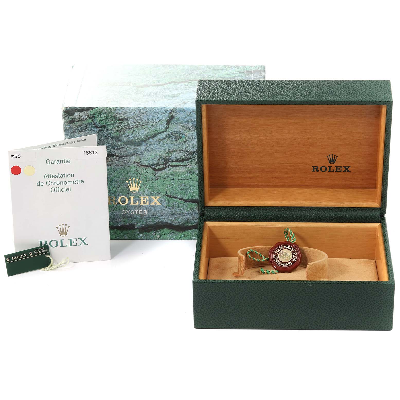 The image shows the open box, manual, and tag for a Rolex Submariner 16613 Men's Steel and Gold (two tone) Blue Dial 16613 Men's Steel and Gold (two tone) Blue Dial watch.