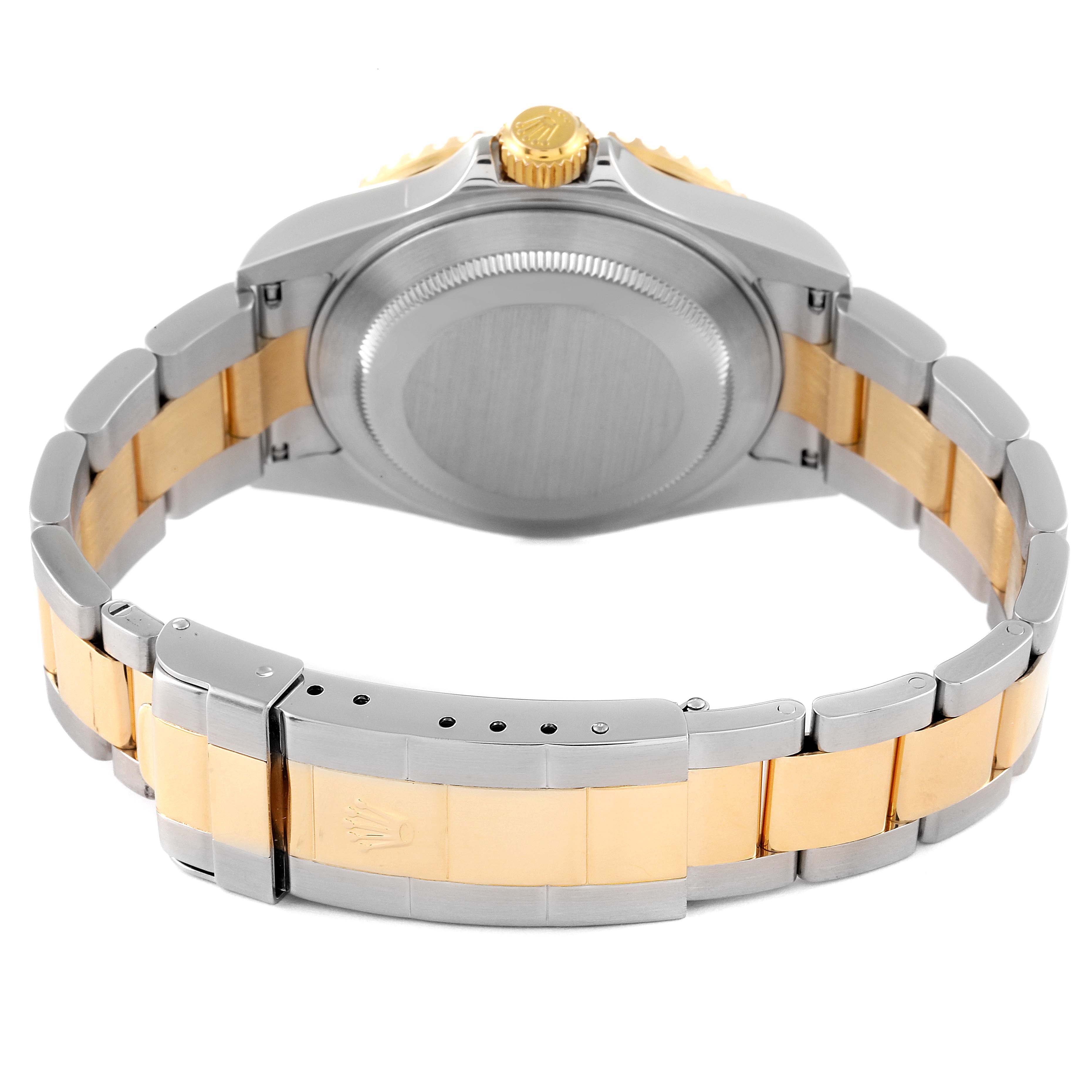 The image shows the back view of the Rolex Submariner 16613 Men's Steel and Gold (two tone) Blue Dial 16613 Men's Steel and Gold (two tone) Blue Dial, highlighting the case back and two-tone bracelet with the clasp.