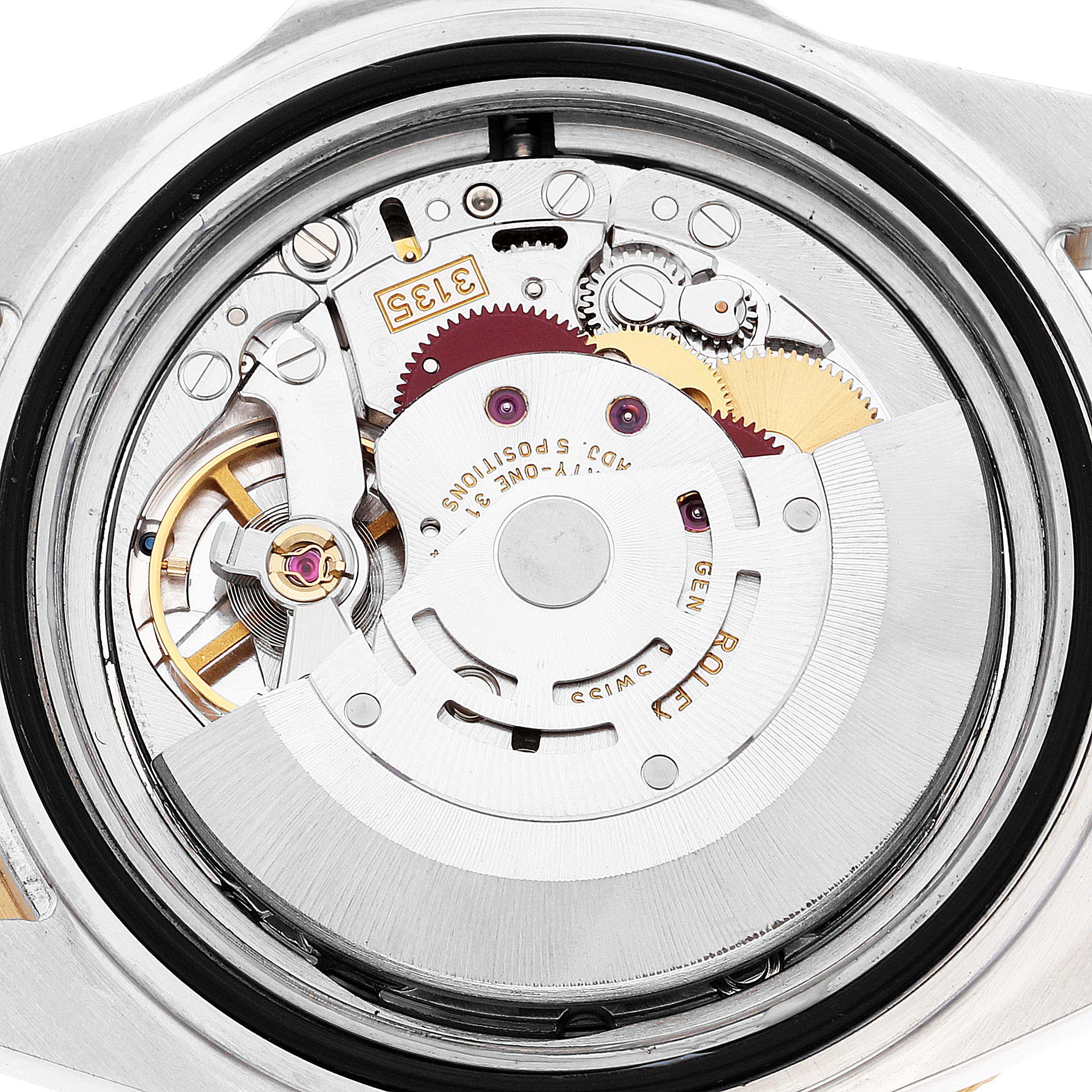 This image shows the internal mechanism and movement of a Rolex Submariner 16613 Men's Steel and Gold (two tone) Blue Dial 16613 Men's Steel and Gold (two tone) Blue Dial watch from a back angle with the case opened.