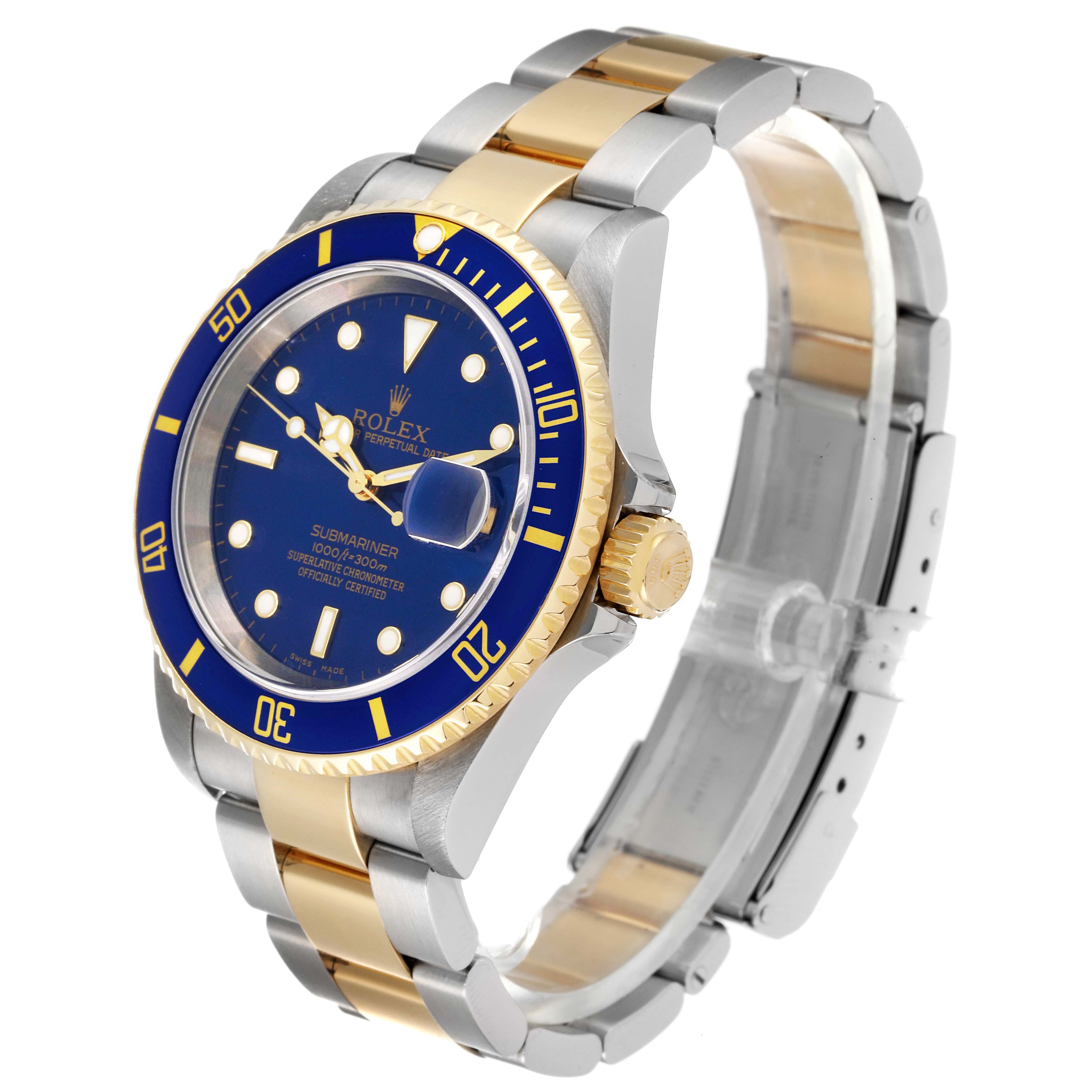 The image shows a Rolex Submariner 16613 Men's Steel and Gold (two tone) Blue Dial 16613 Men's Steel and Gold (two tone) Blue Dial watch at an angle highlighting the face, bezel, and bracelet.